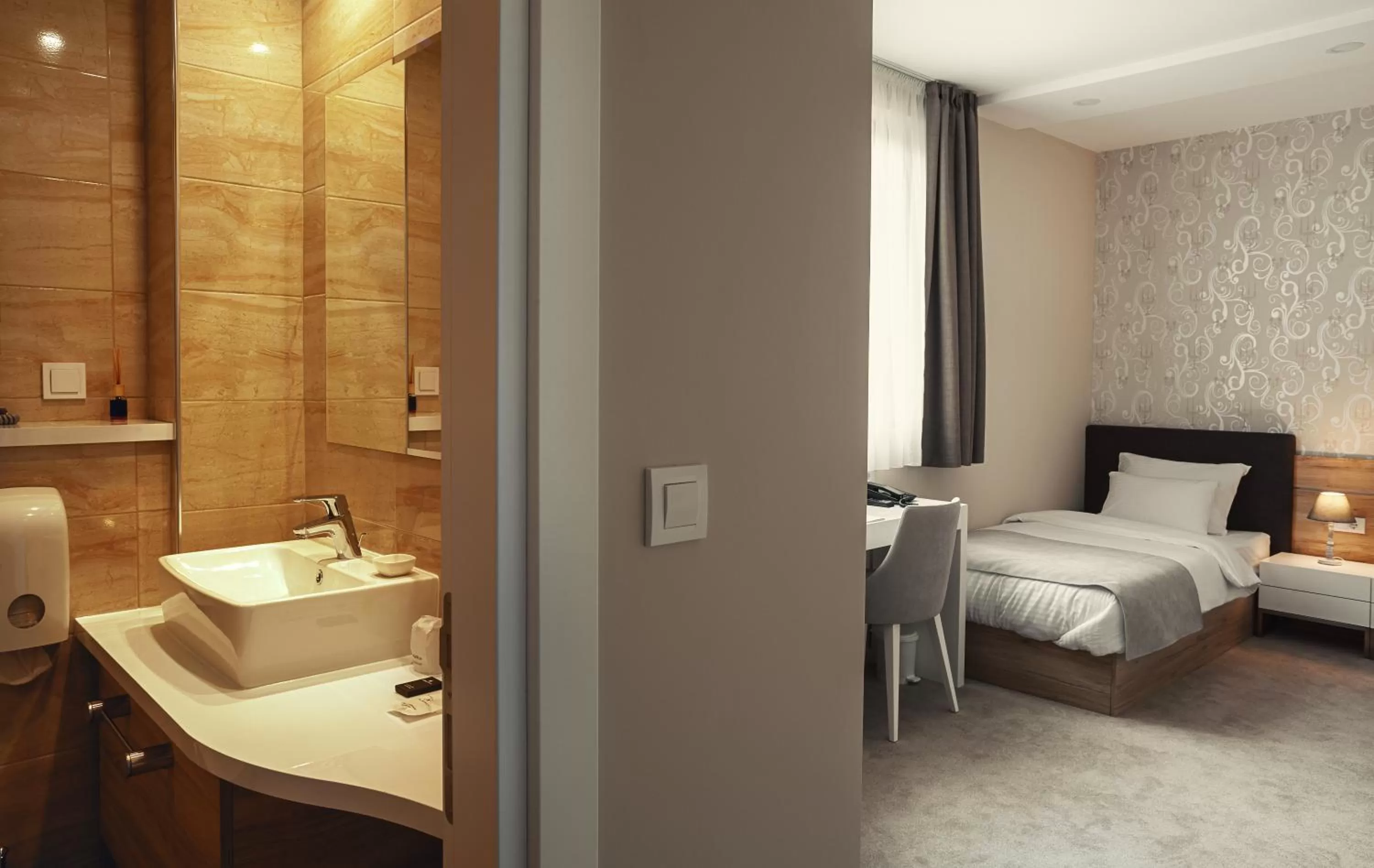 Bed, Bathroom in IG Hotel