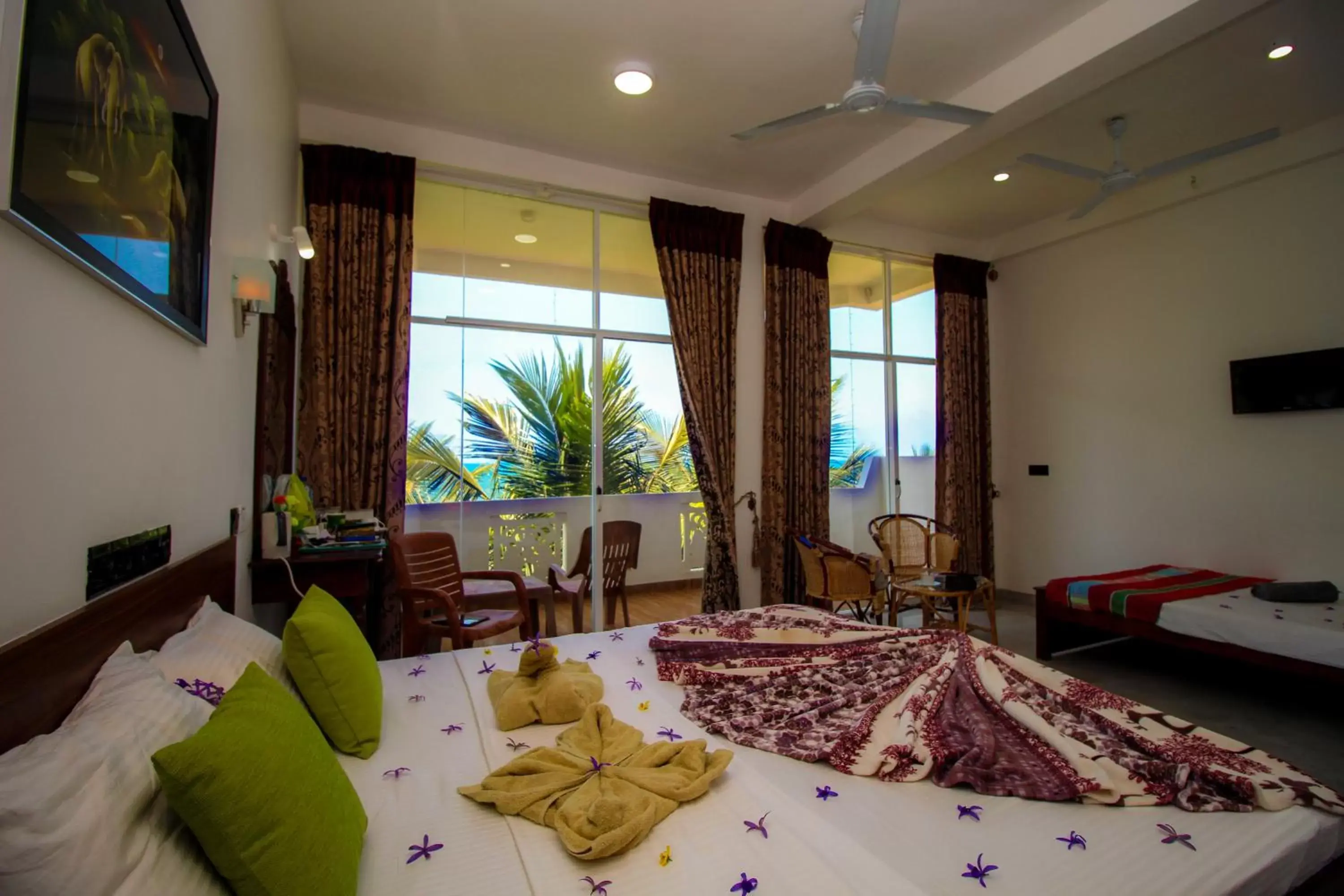 Deluxe Triple Room with Sea View in Hotel Coconut Bay Deluxe Triple Room with Sea View in Hotel Coconut Bay