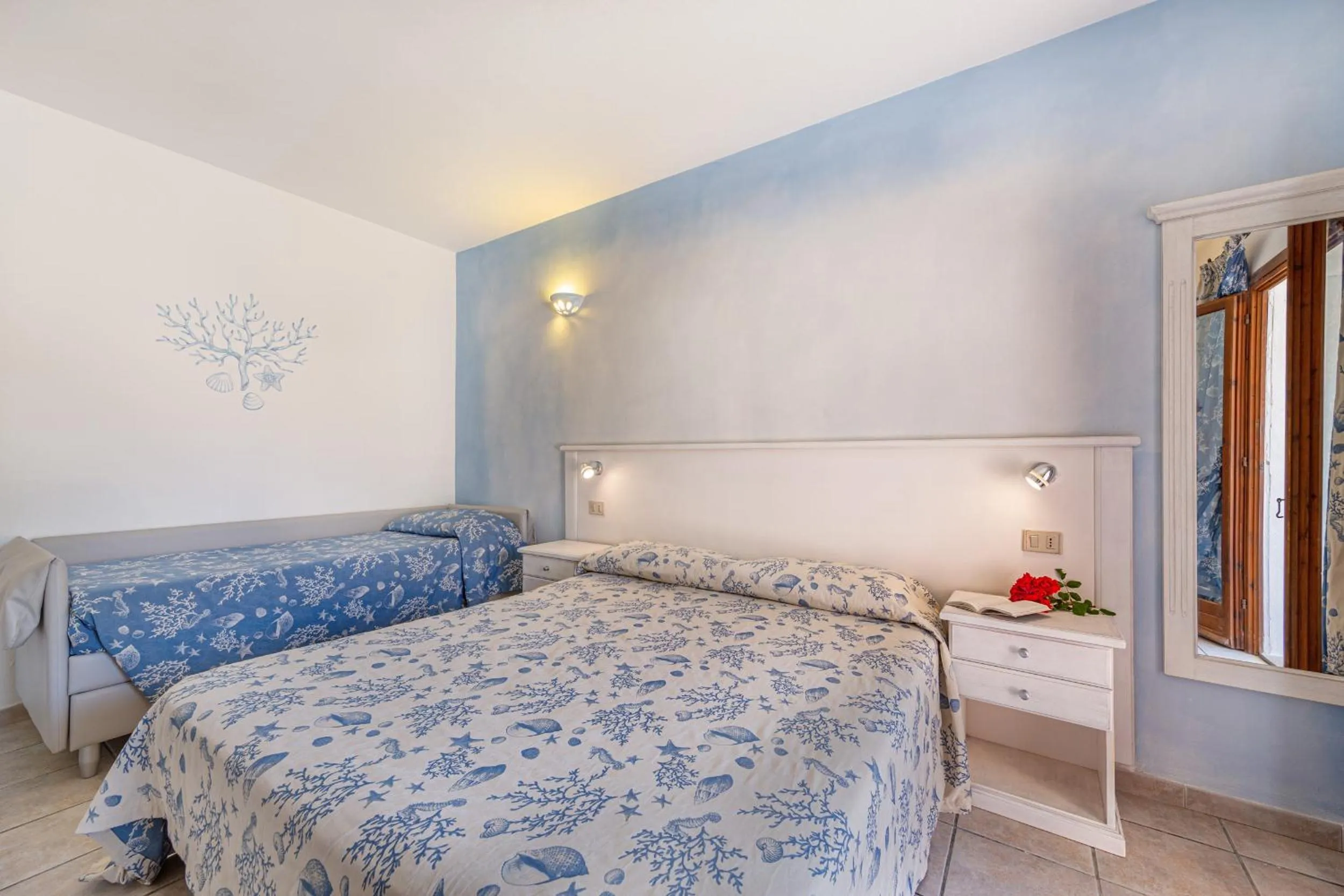 Bed in Marina Manna Hotel and Club Village