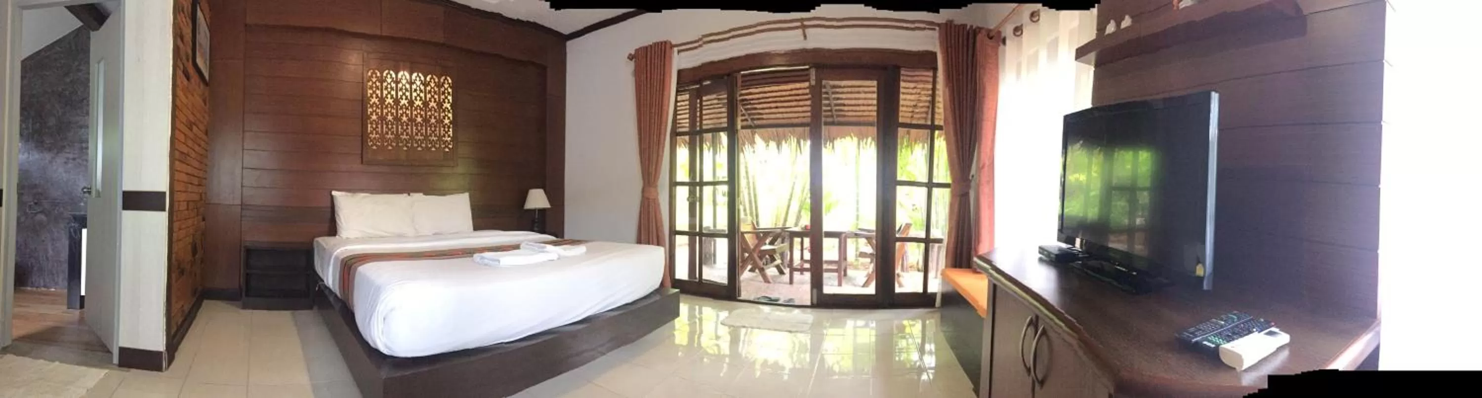 Bed in Vipa Tropical Resort