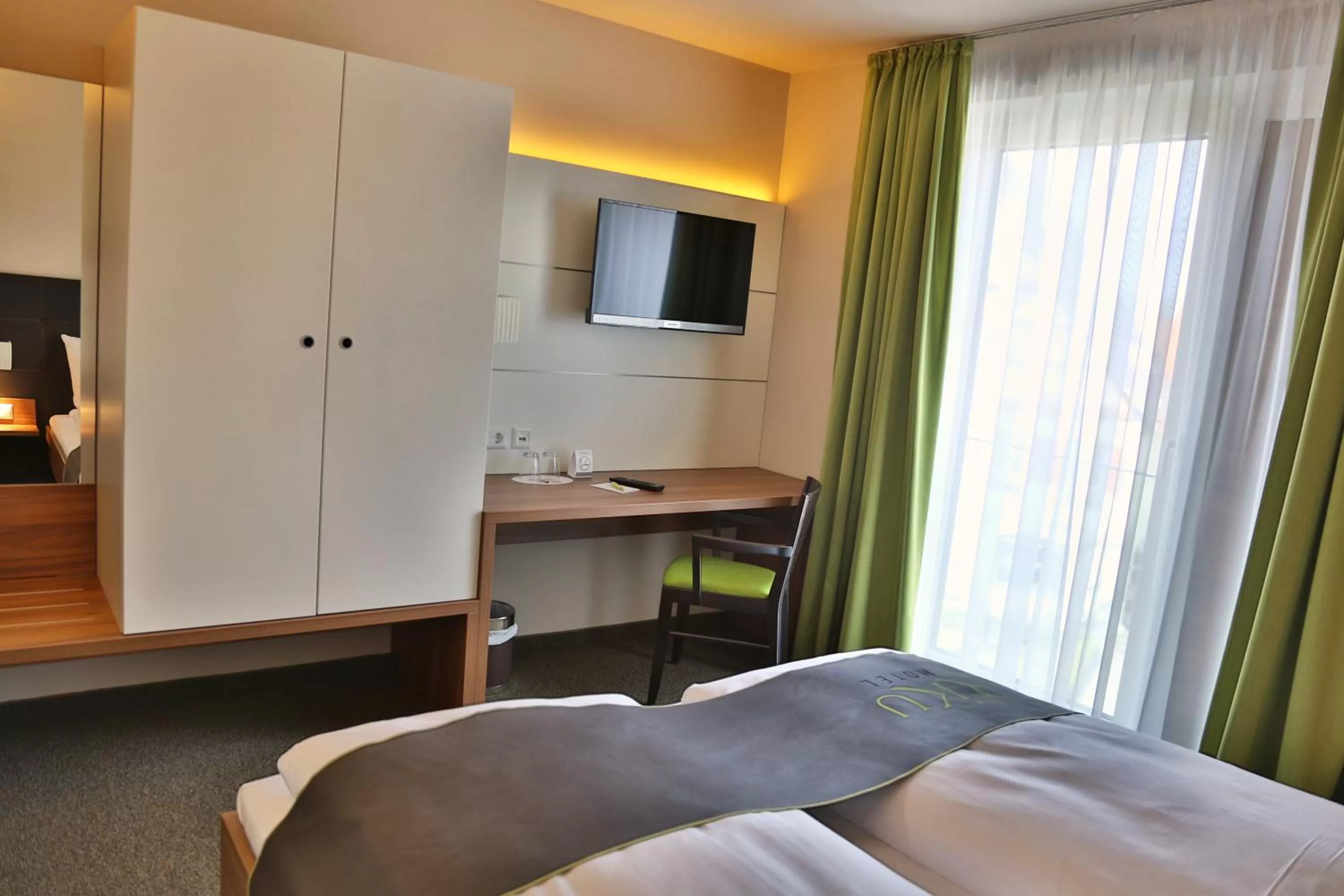 Day, Bed in RiKu HOTEL Weißenhorn