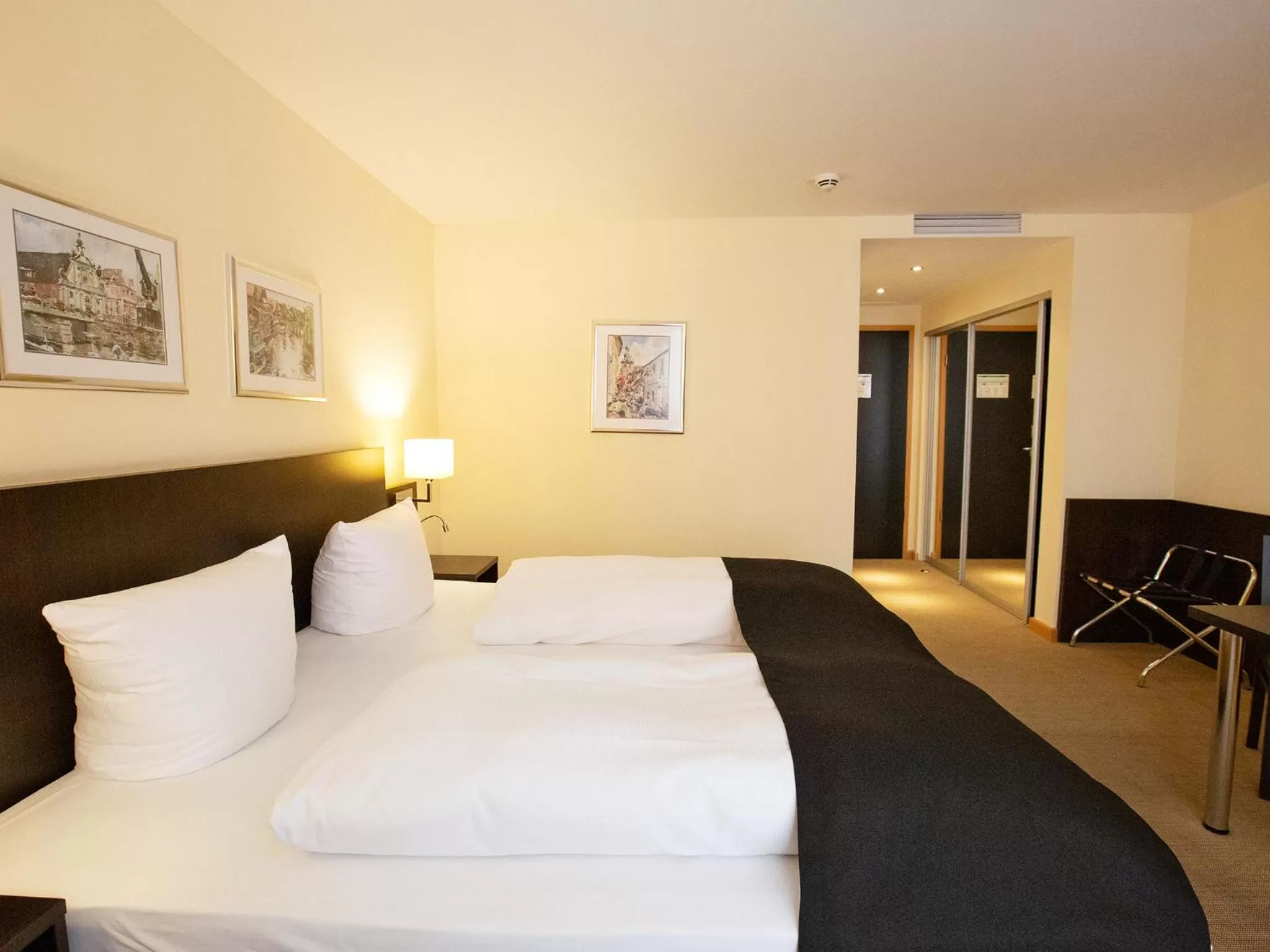 Photo of the whole room, Bed in DORMERO Hotel Altes Kaufhaus Lüneburg