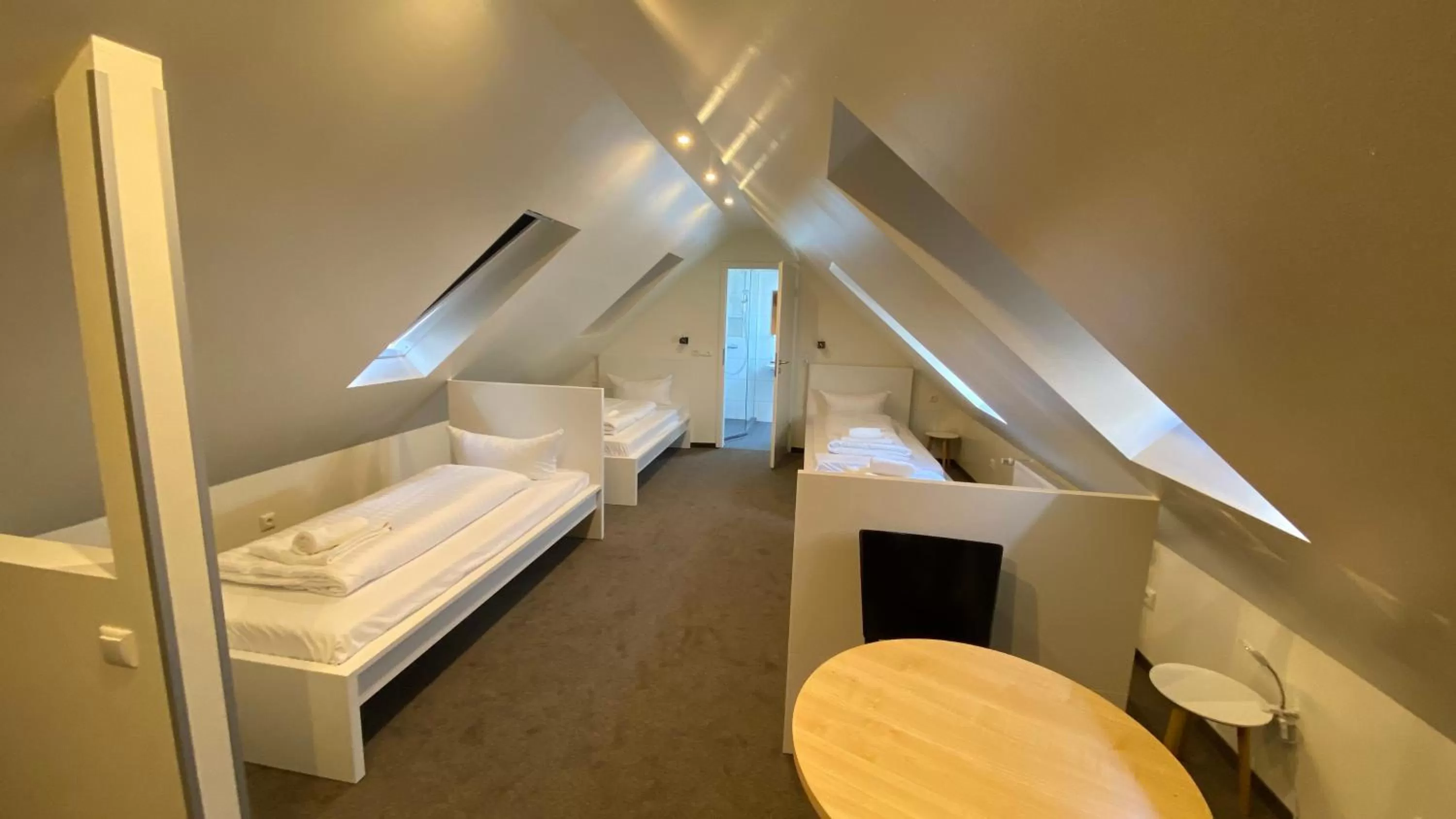 Photo of the whole room, Bed in JJ Hotel Hannover-City-Pension