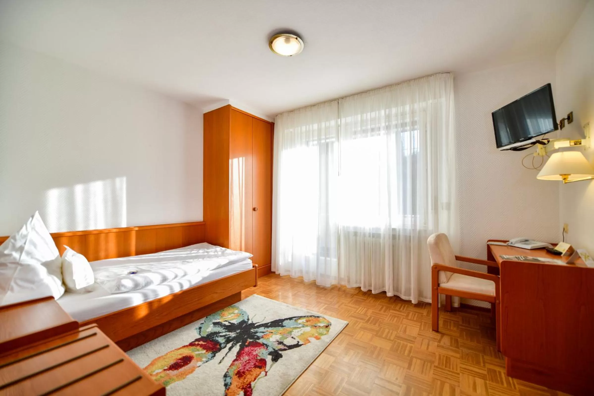 Bed in Hotel Zur Post