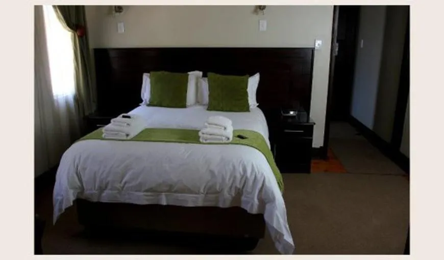 Bed in Goodey's Guesthouse