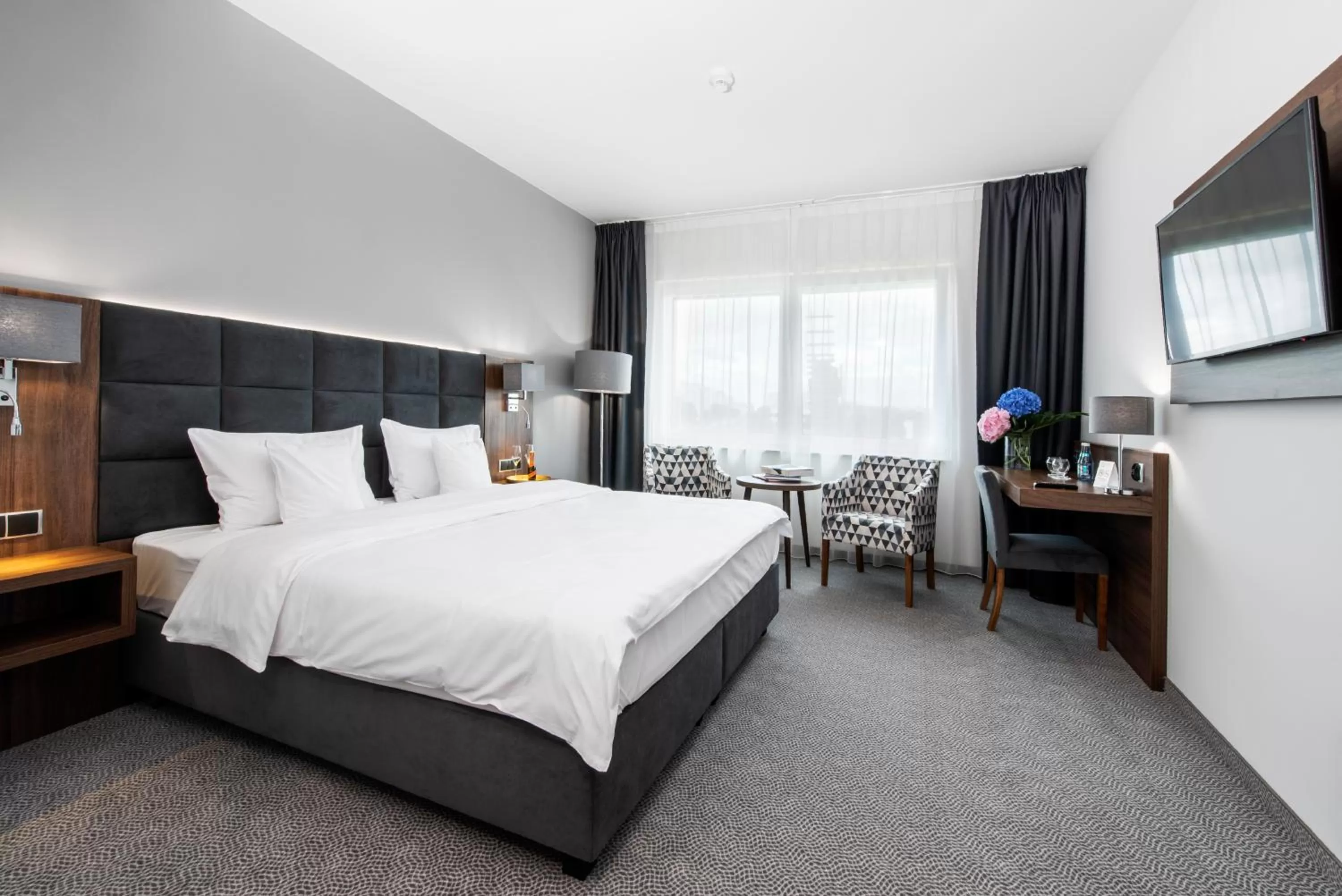 Bed in DB Hotel Wrocław