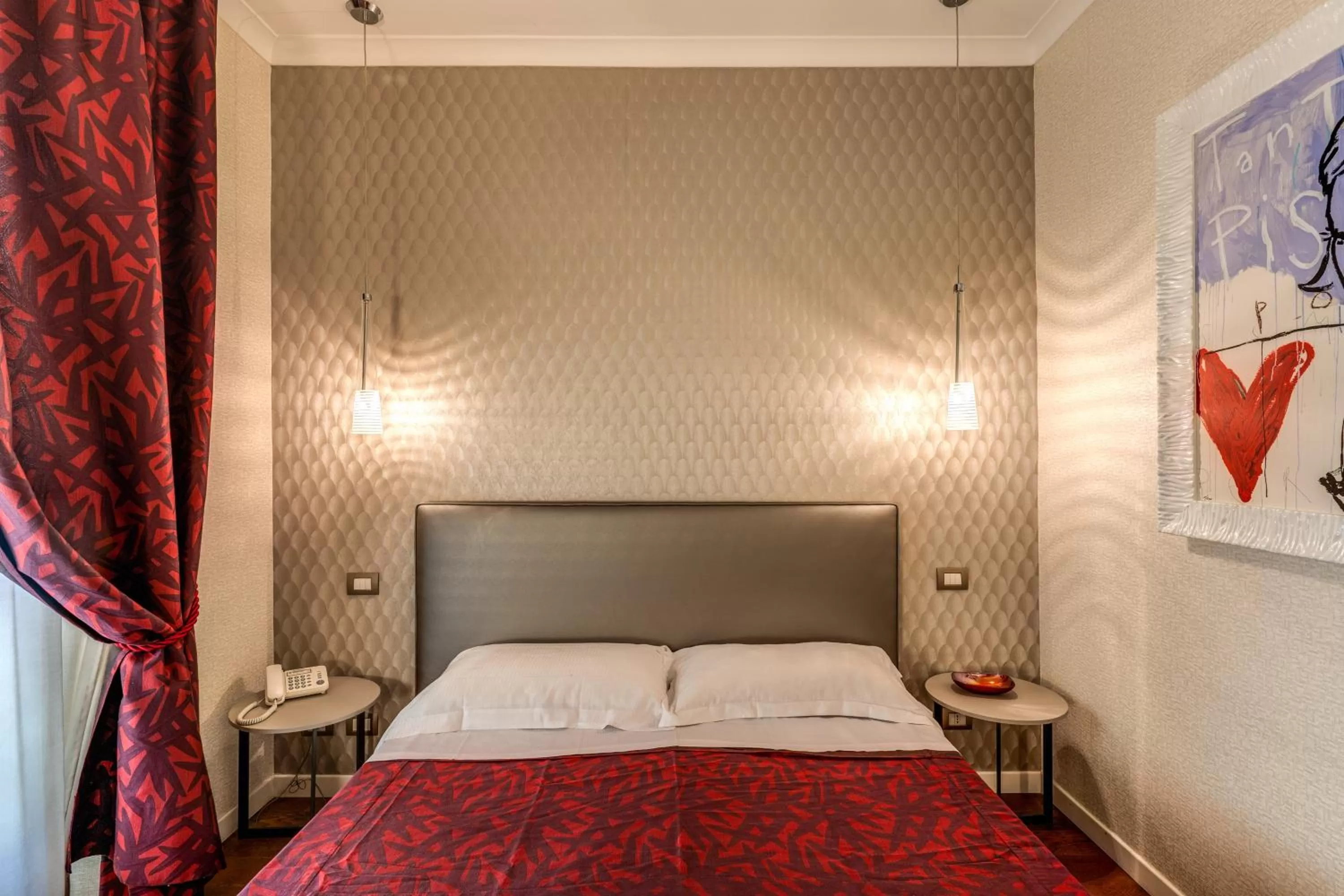 Bed in Roma Boutique Hotel