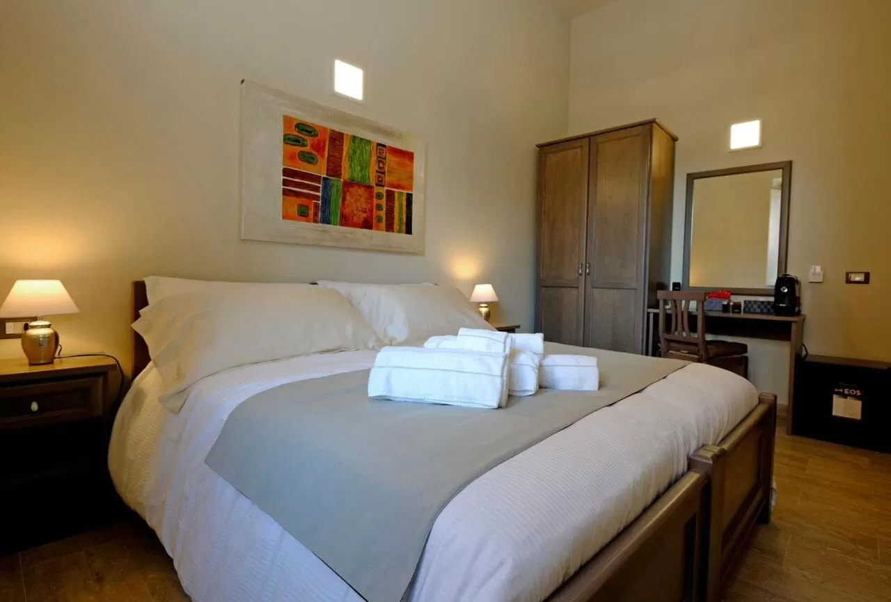 Photo of the whole room, Bed in EOS Room and Breakfast