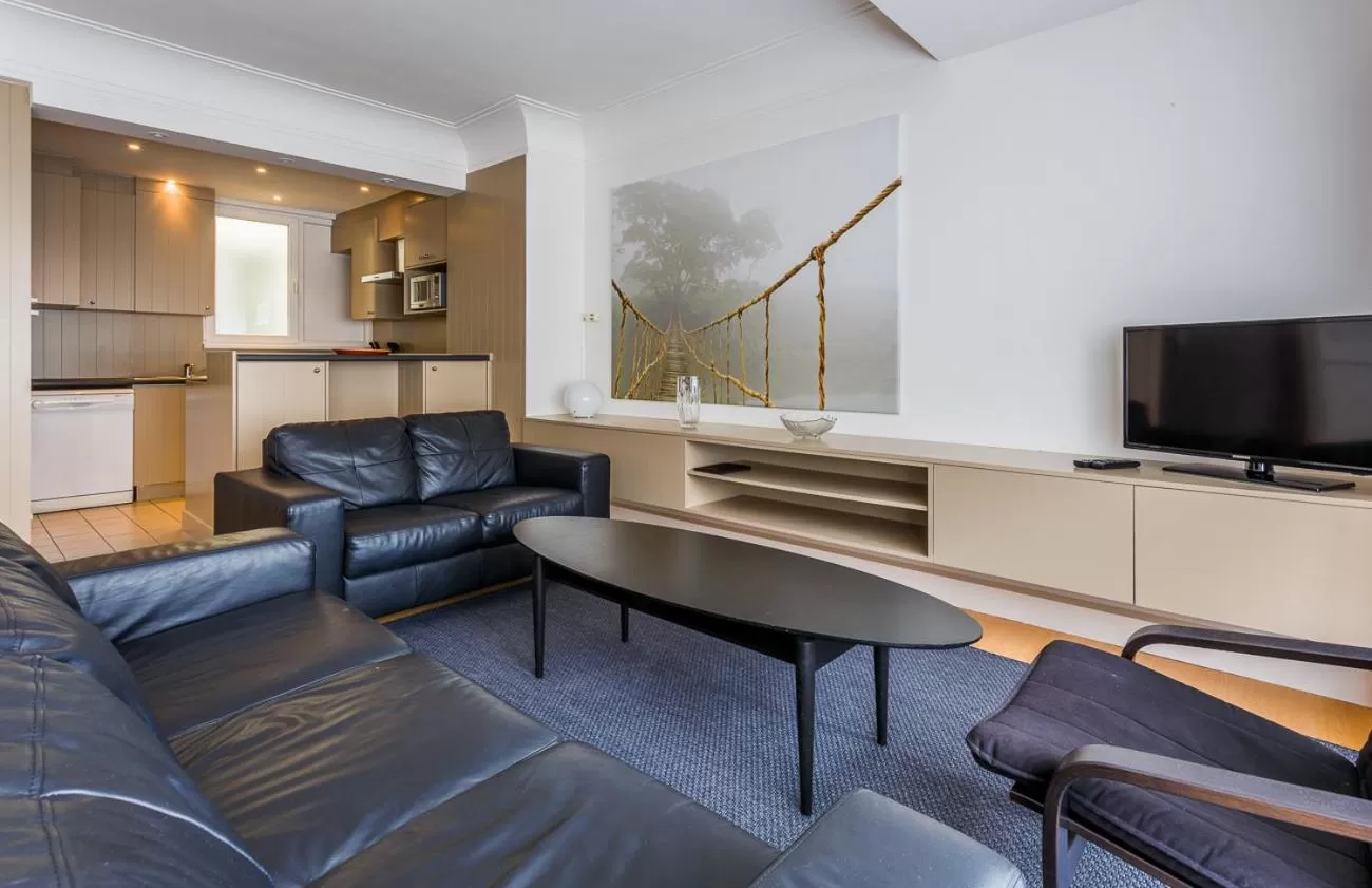 Living room in Residentie Sweetnest met hotelservice à la carte - 3 dubbel kamers