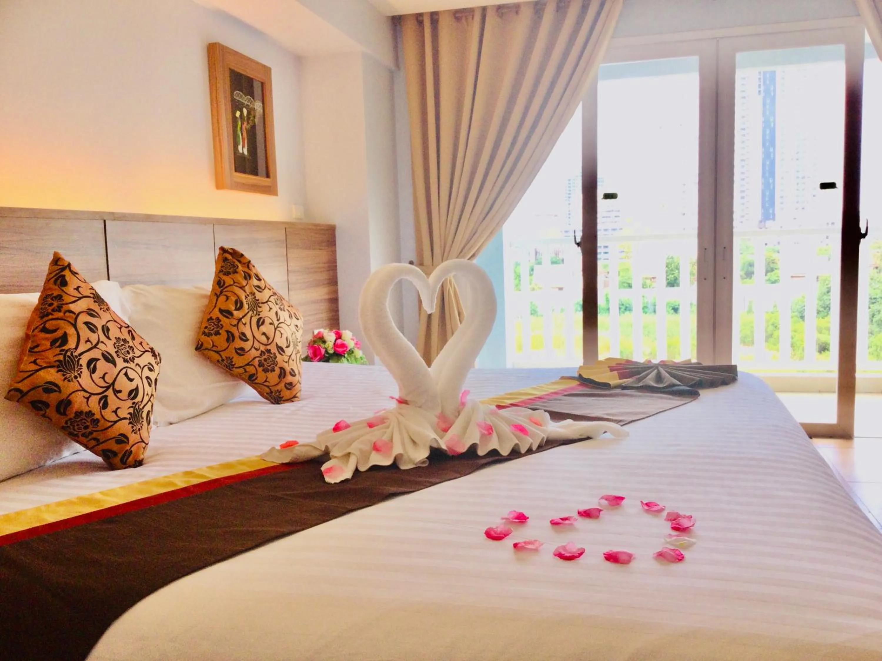 Photo of the whole room, Bed in Saisawan Beach Luxury Hotel