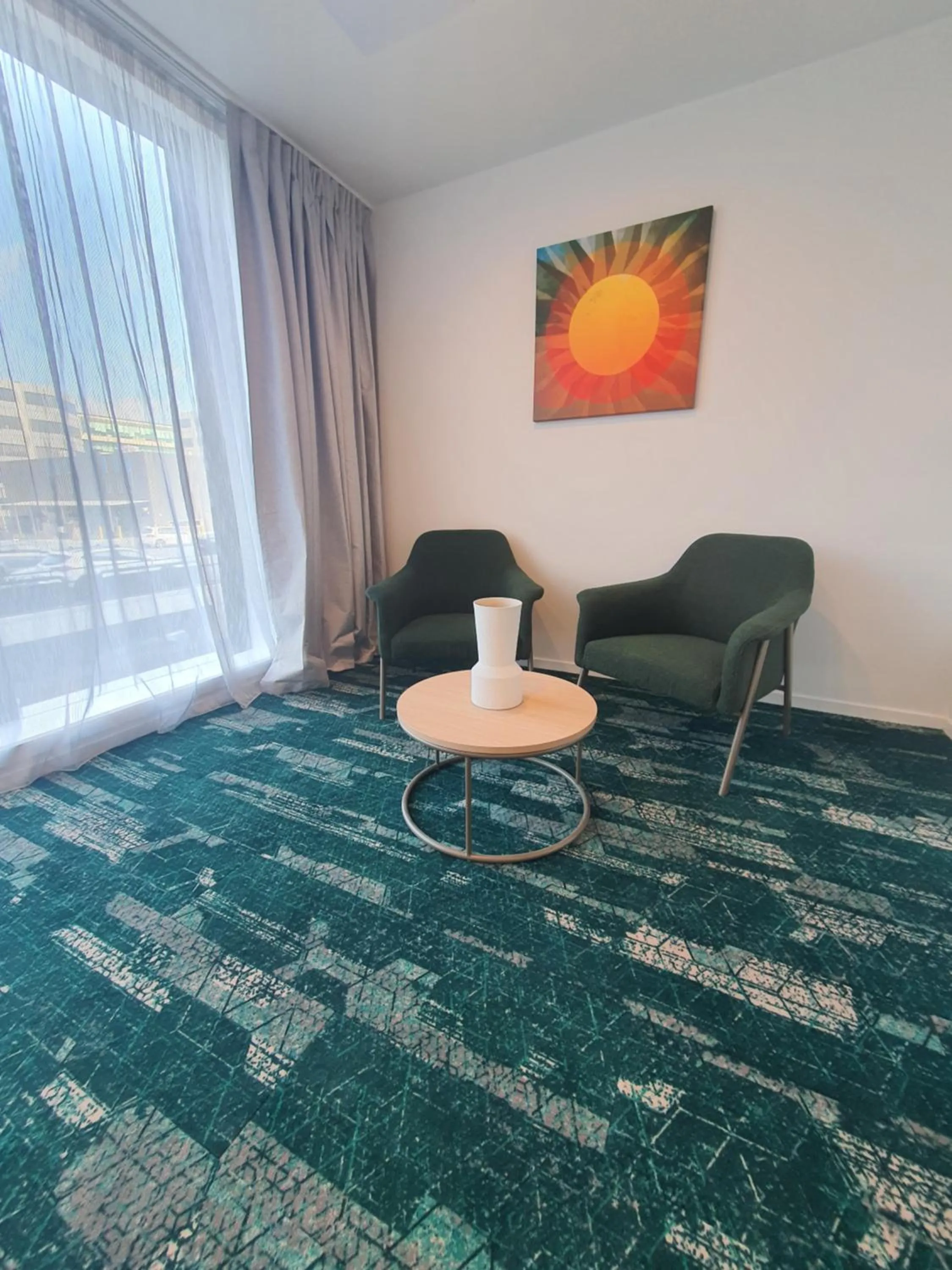 Seating area in La Quinta by Wyndham Ellerslie Auckland