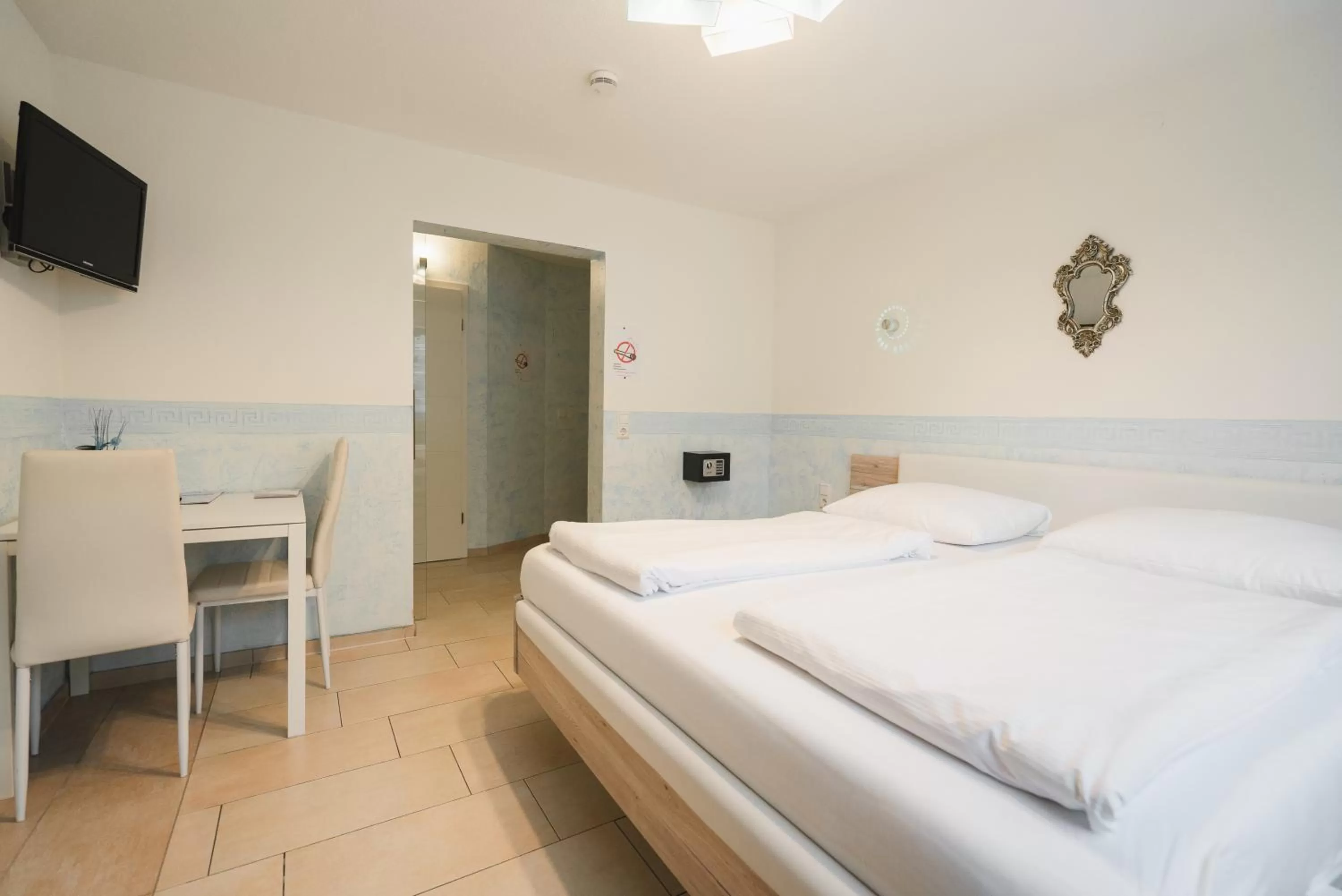 Bed in Park Hotel & Gästehaus Rust