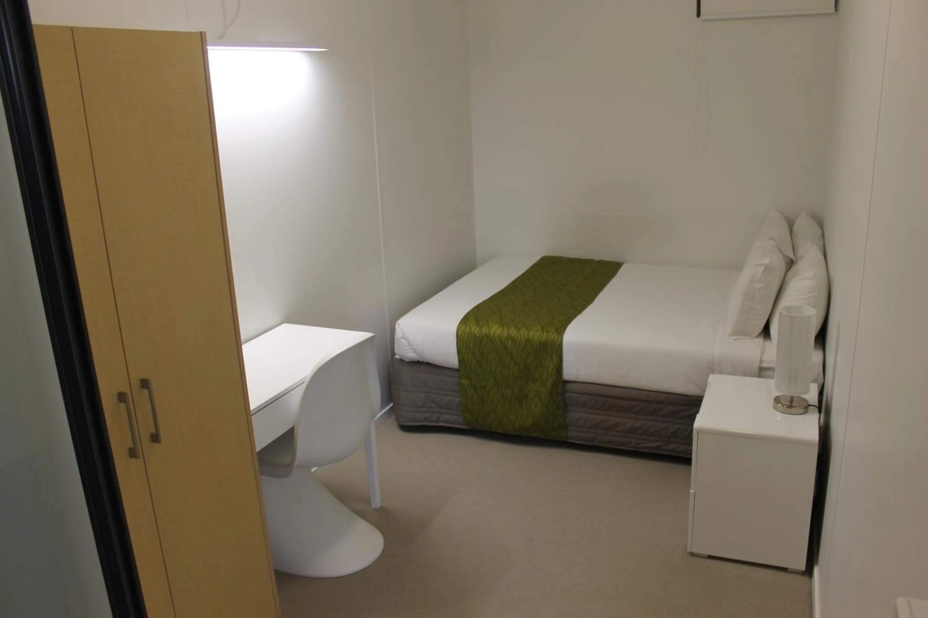 Photo of the whole room, Bed in MCentral Apartments Manukau