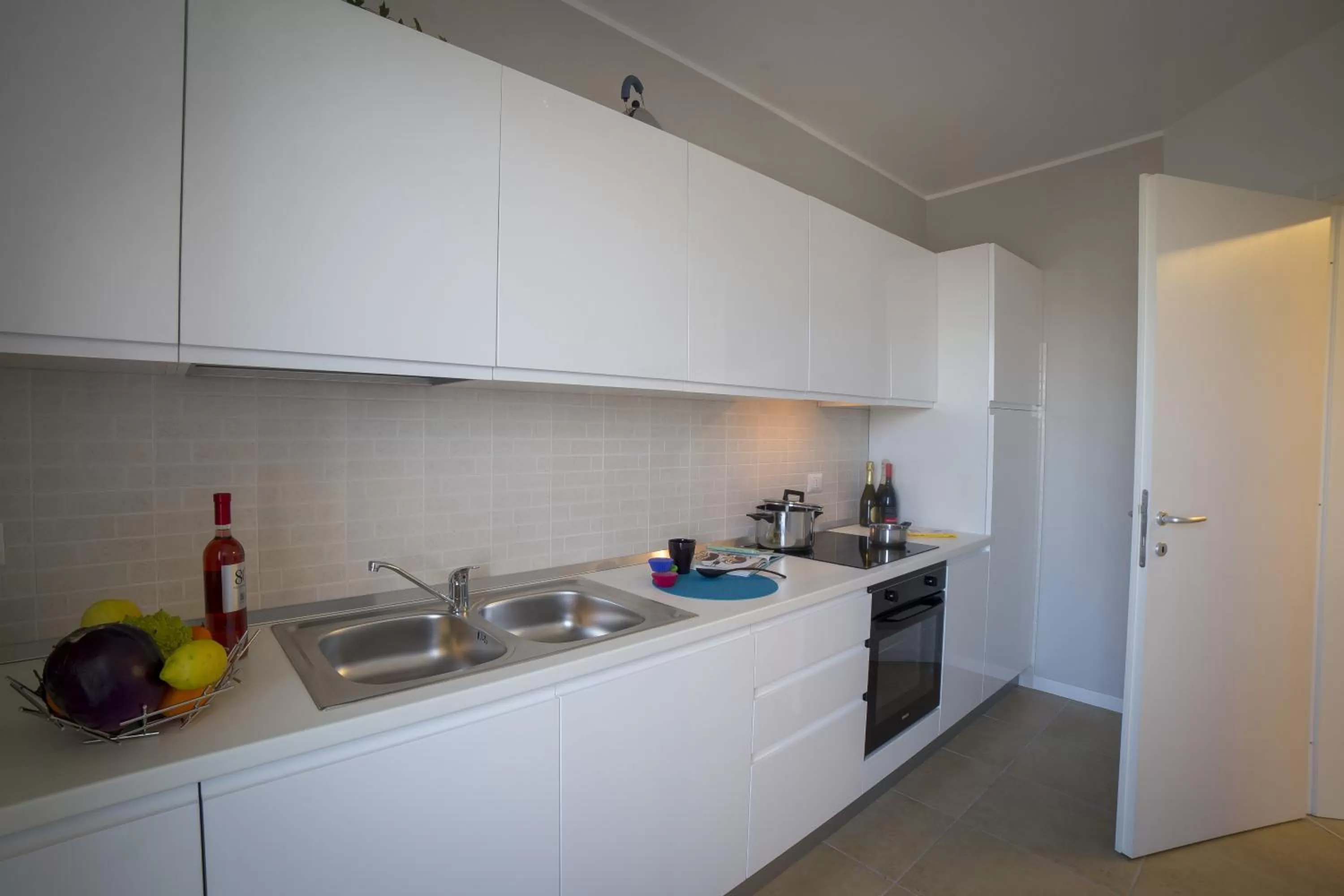 Kitchen or kitchenette in Aurum Aparthotels Bicocca
