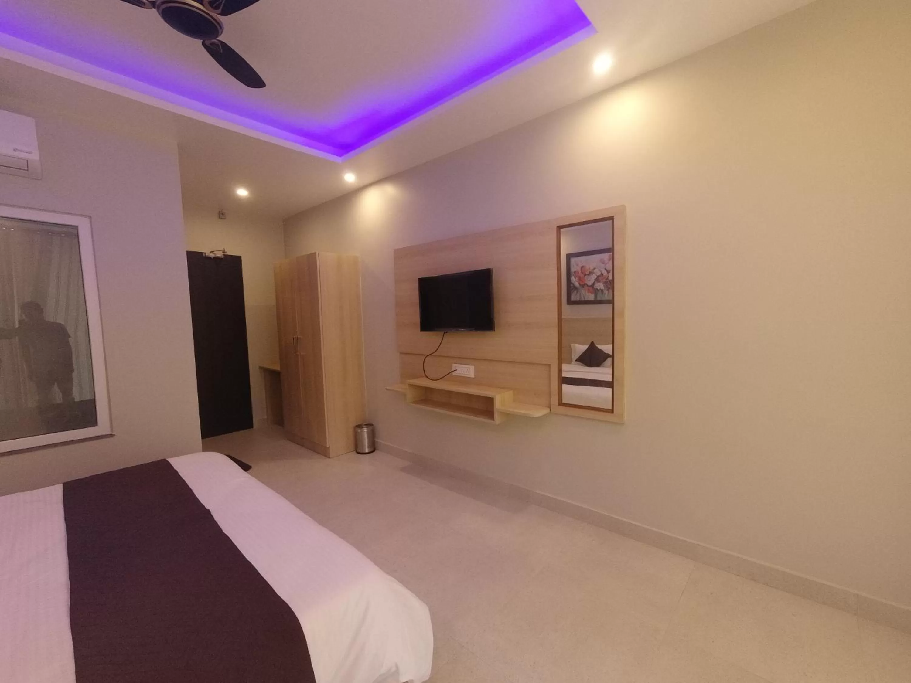Bedroom, TV/Entertainment Center in Punyah Residency Rishikesh