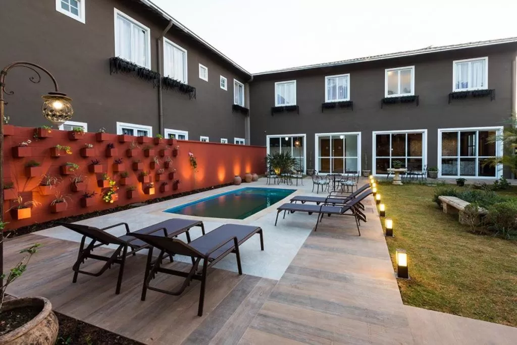 Garden, Swimming Pool in Pousada Armazém 26