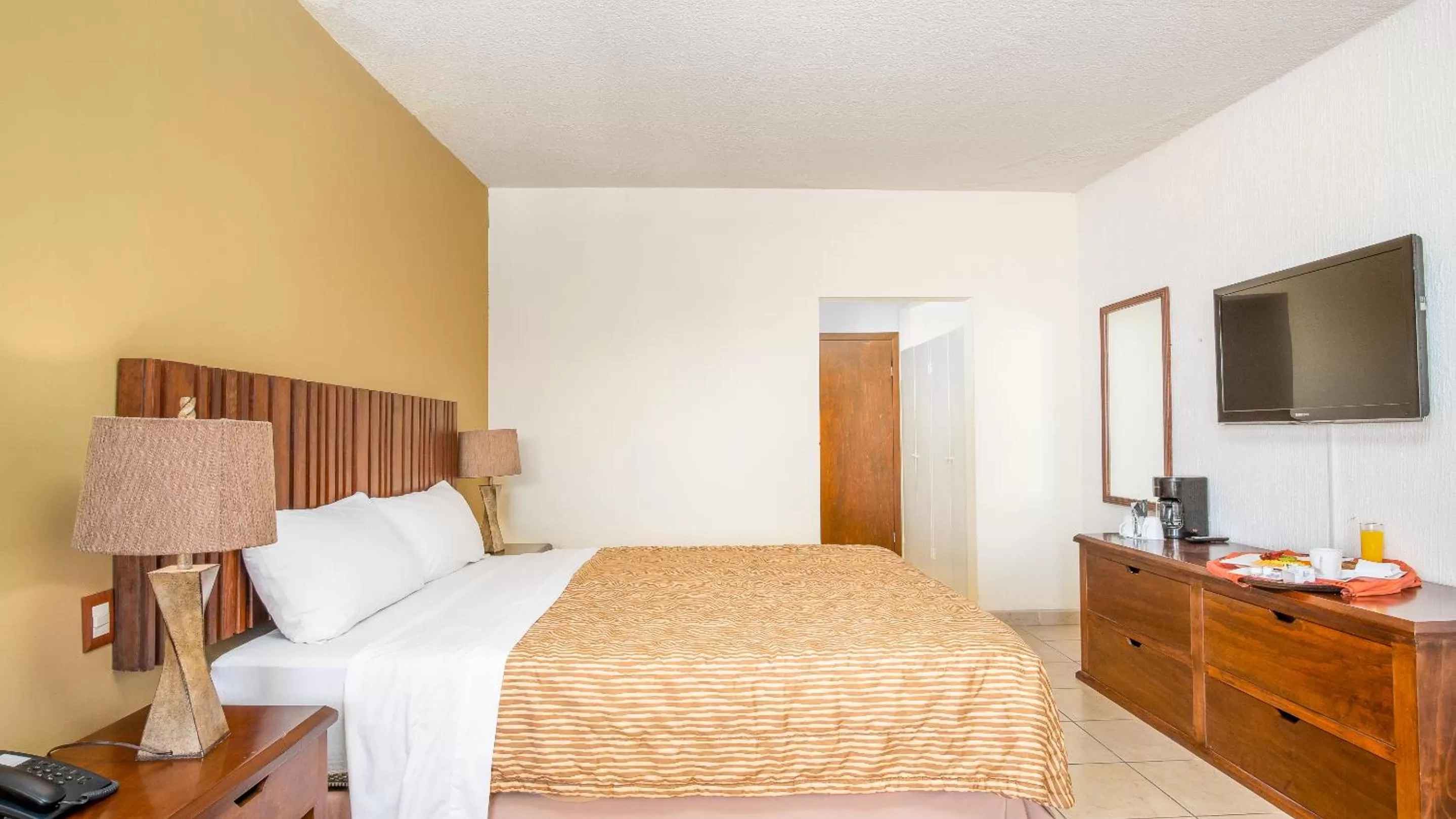 Bed in Puerto Nuevo Baja Hotel & Villas