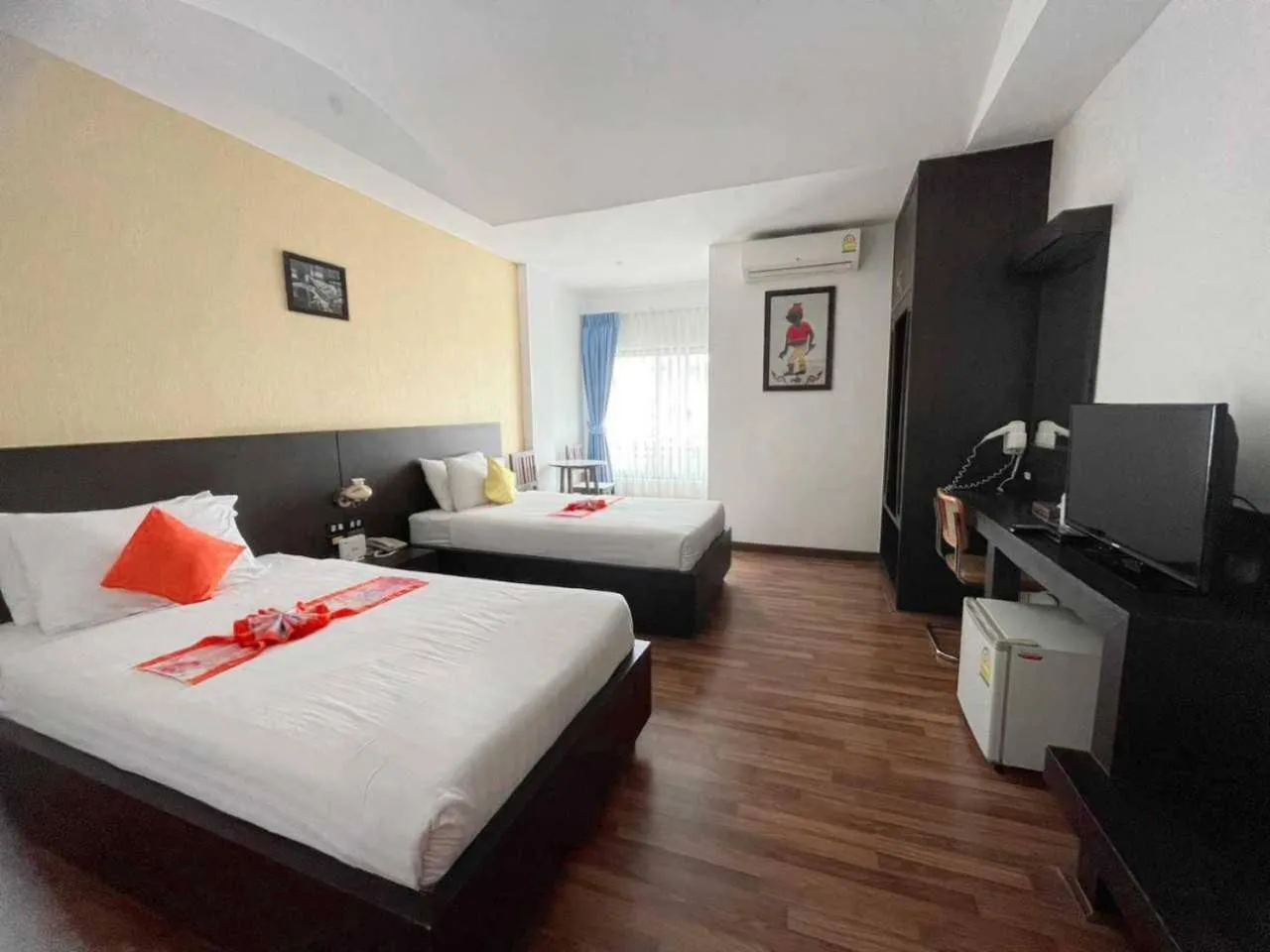 Bed in Jingjit Hotel