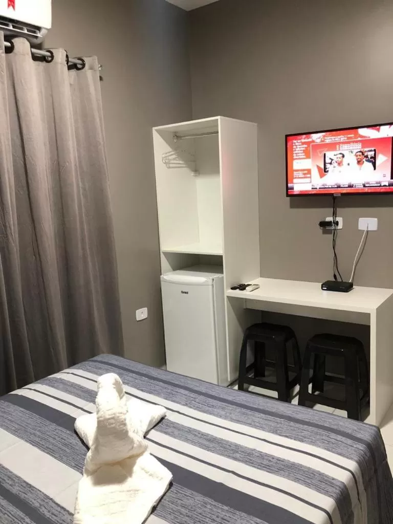 TV/Entertainment Center in Pousada Praia Bela