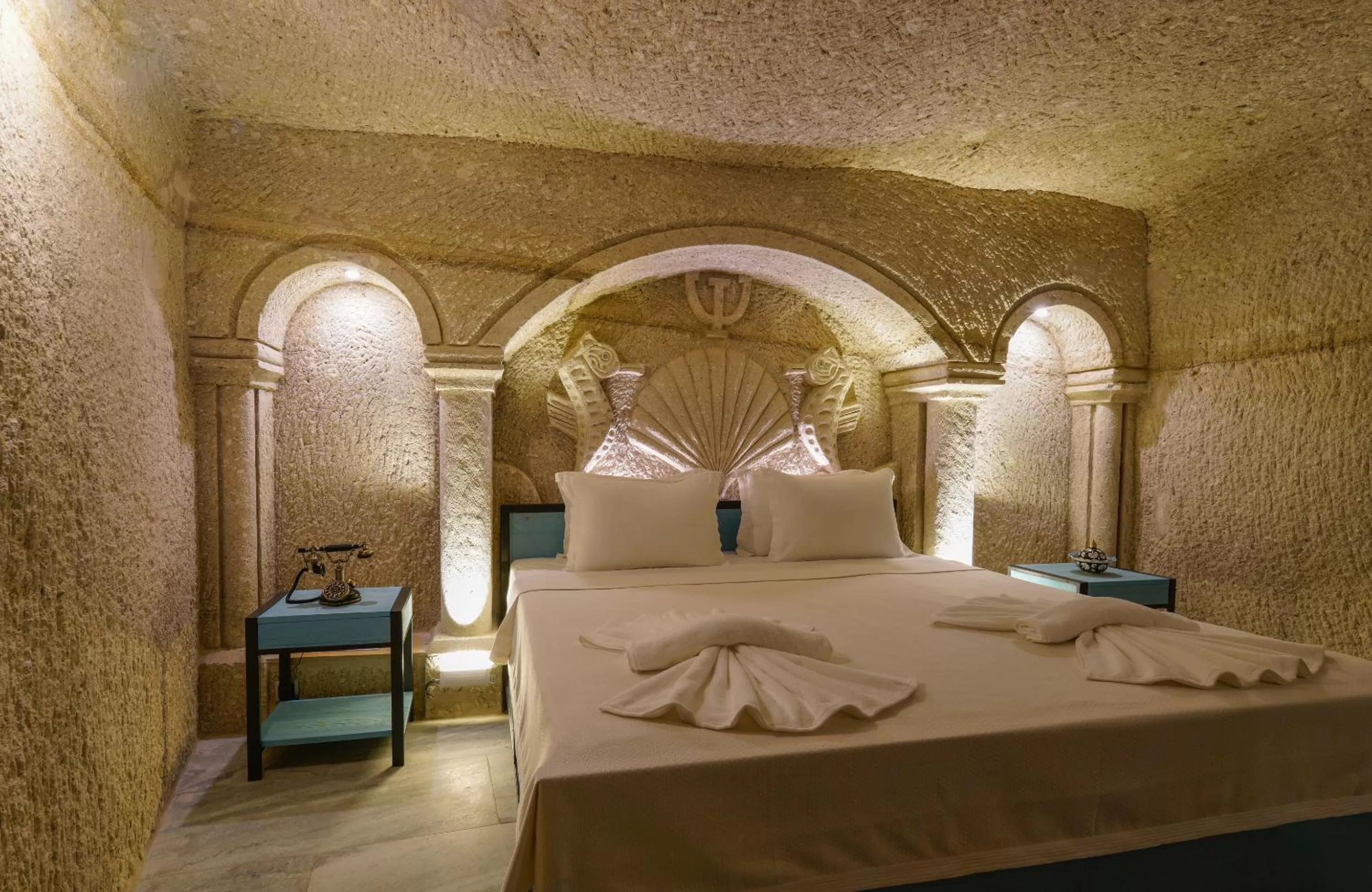 Bed in The Niche Cave Hotel