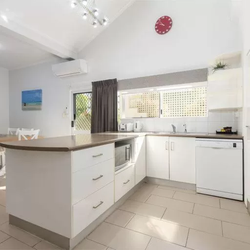 Kitchen/Kitchenette in TiTree Village Holiday Apartments