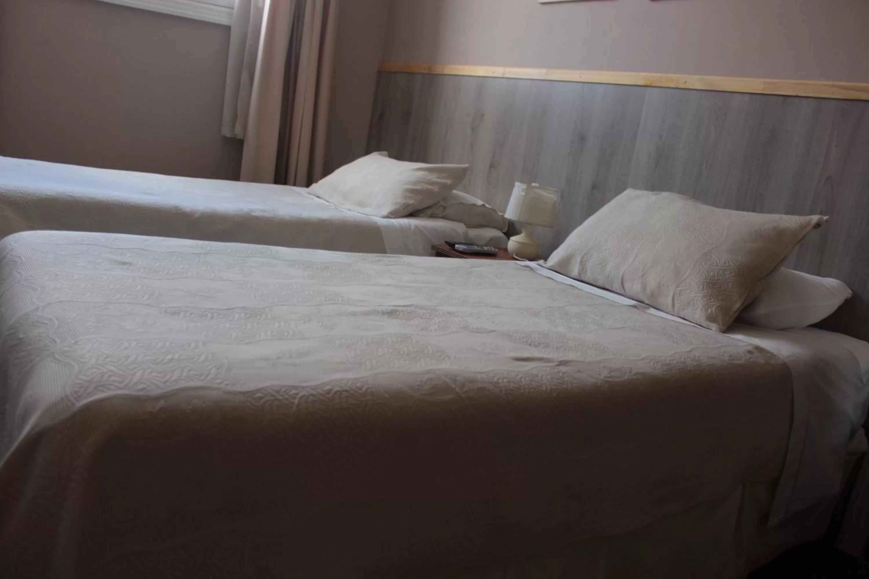 Bed in Alhambra Hotel