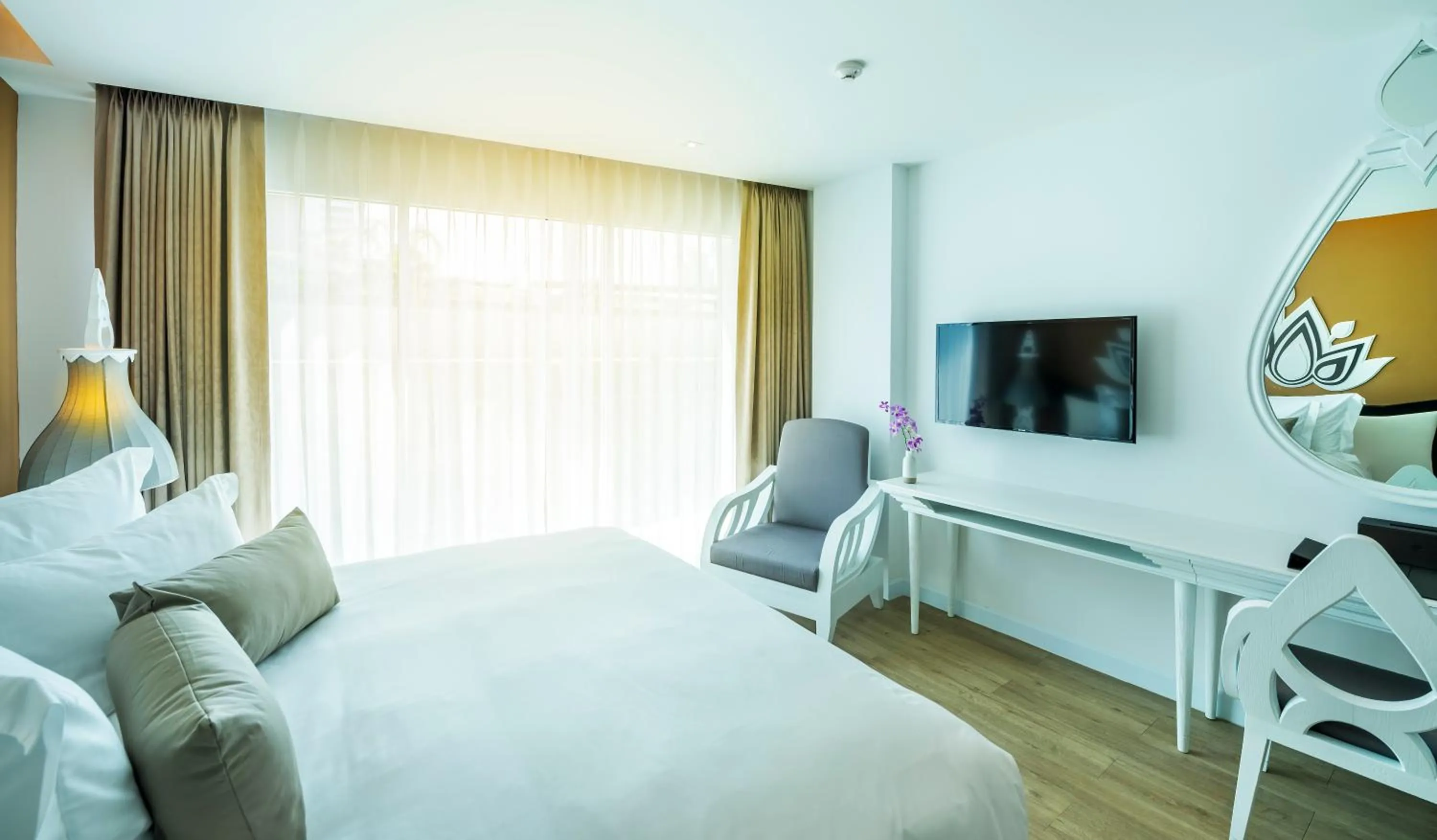 Decorative detail, Bed in Anajak Bangkok Hotel - SHA Plus