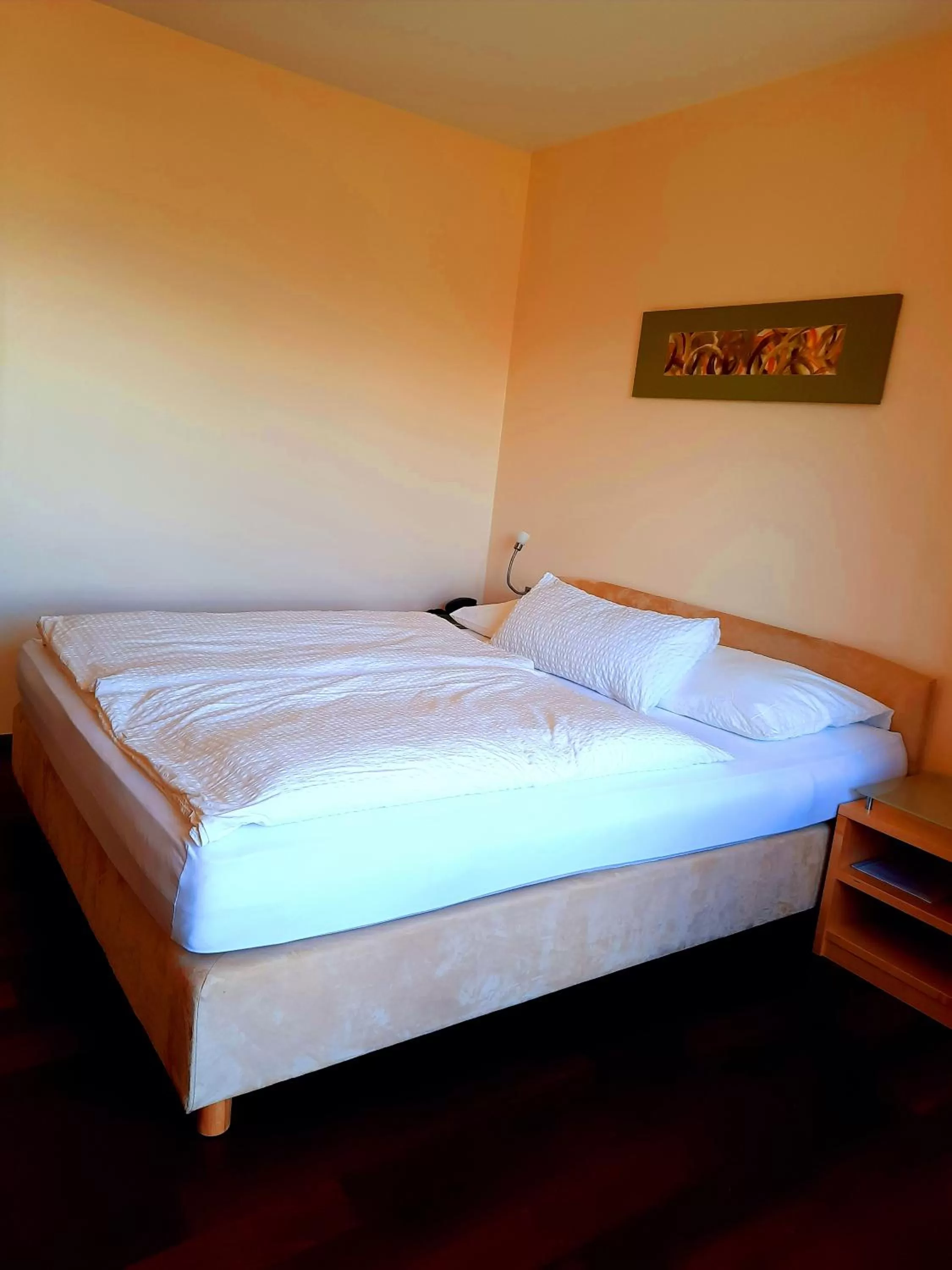Bed in Das smarte Hotel garni