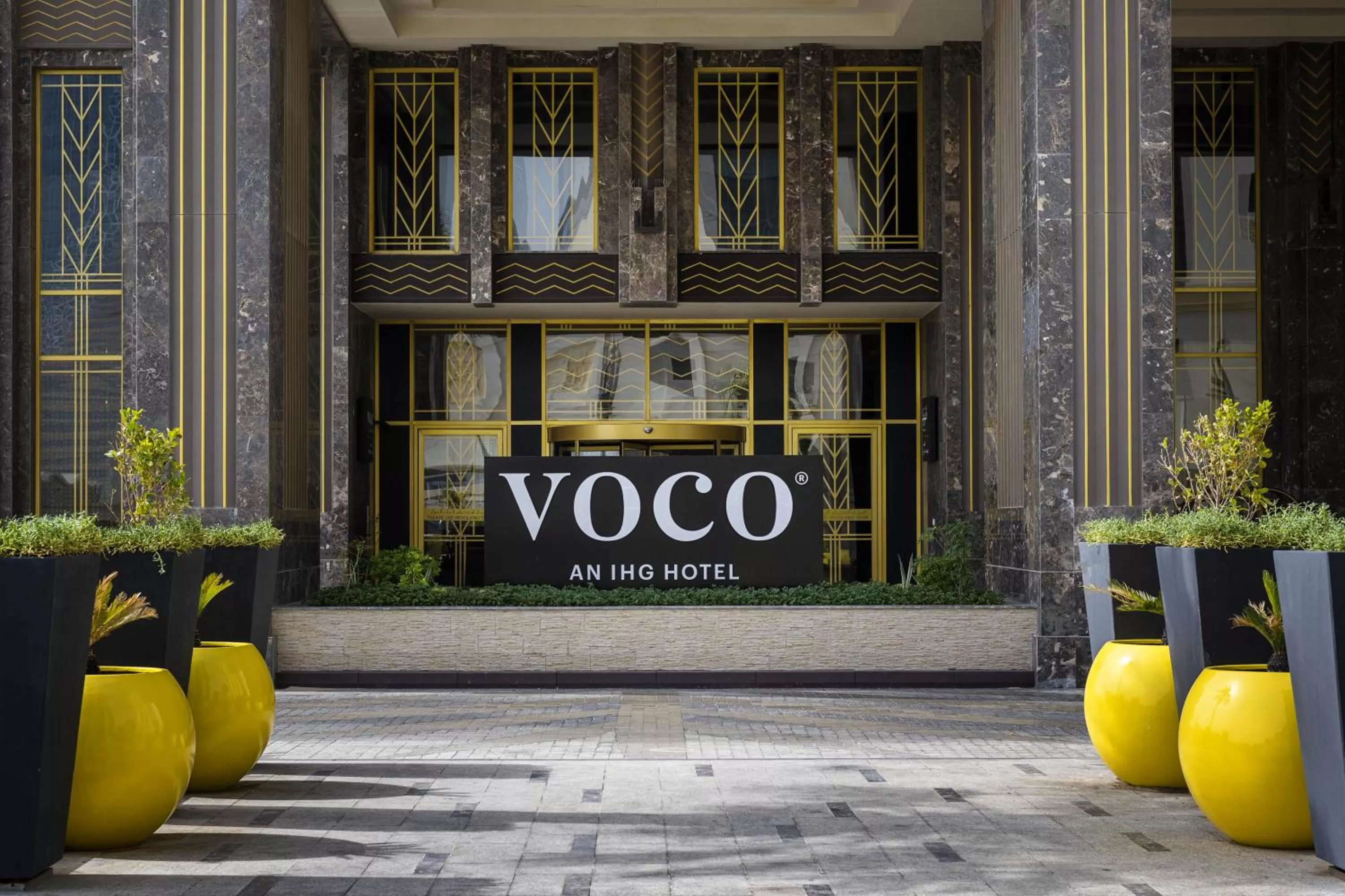Facade/entrance in voco Doha West Bay Suites by IHG
