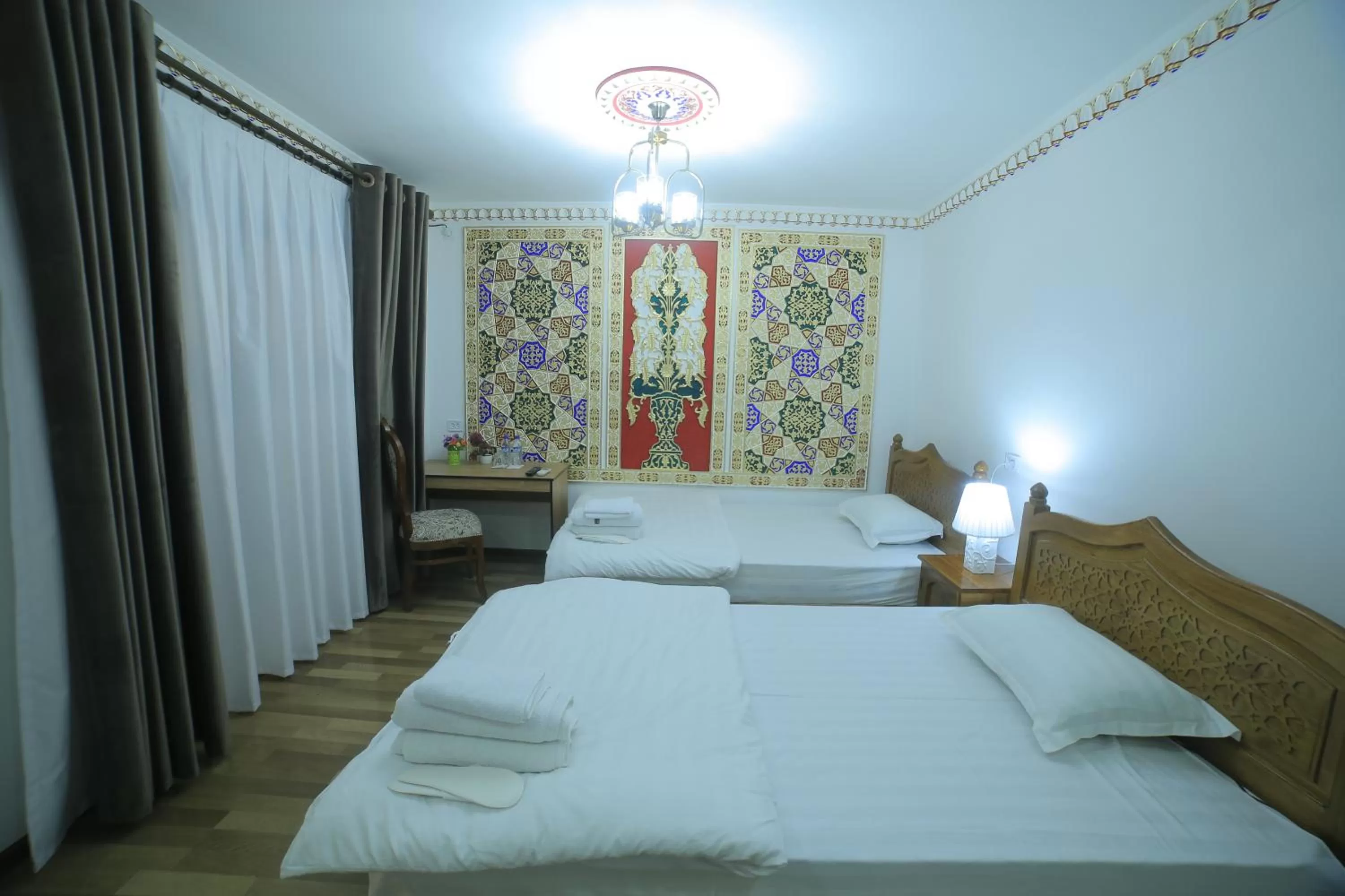 Bed in Bukhara Baraka Boutique Hotel