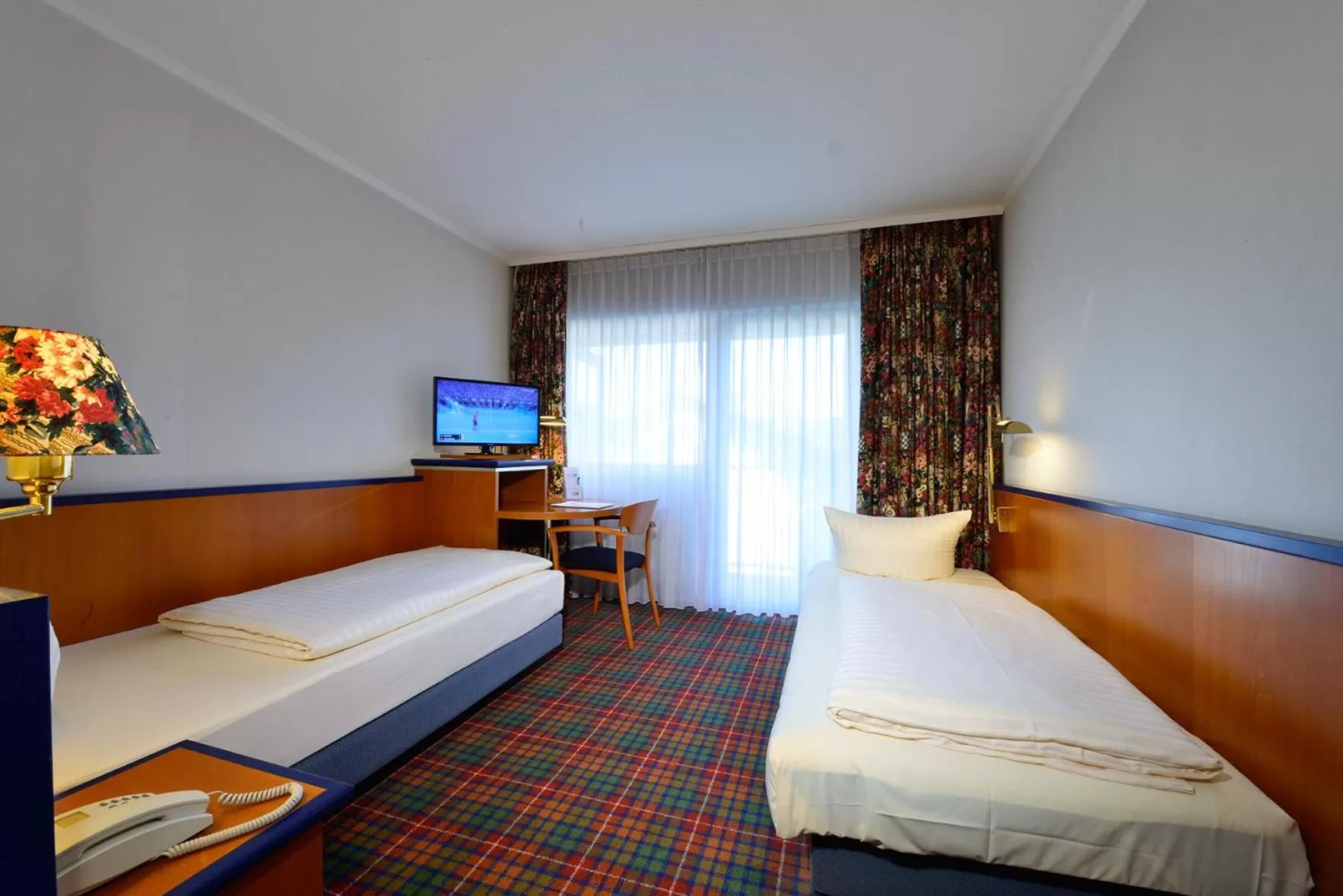 Bed in Rheinhotel Vier Jahreszeiten Bad Breisig