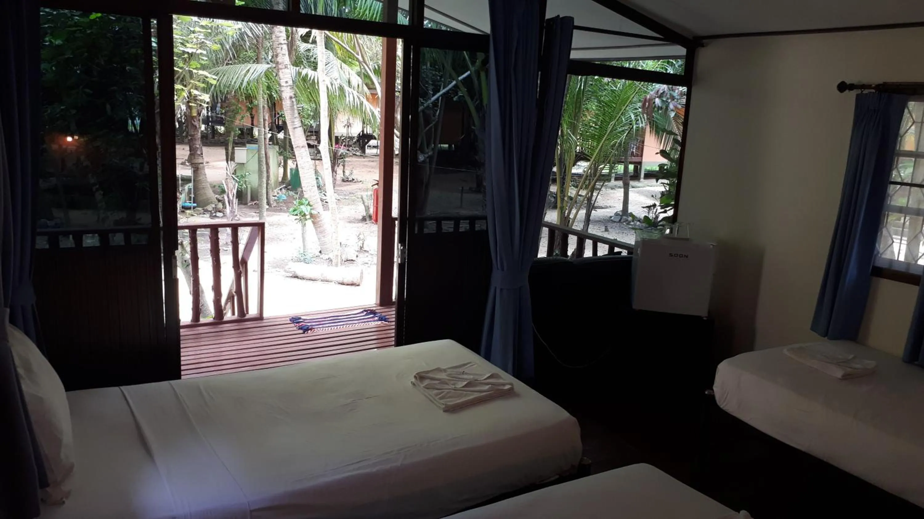 Bed in Moonhut Bungalows