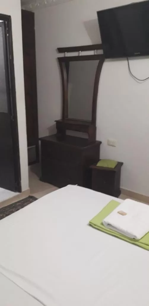 Bed in Hotel Mansión del Cesar