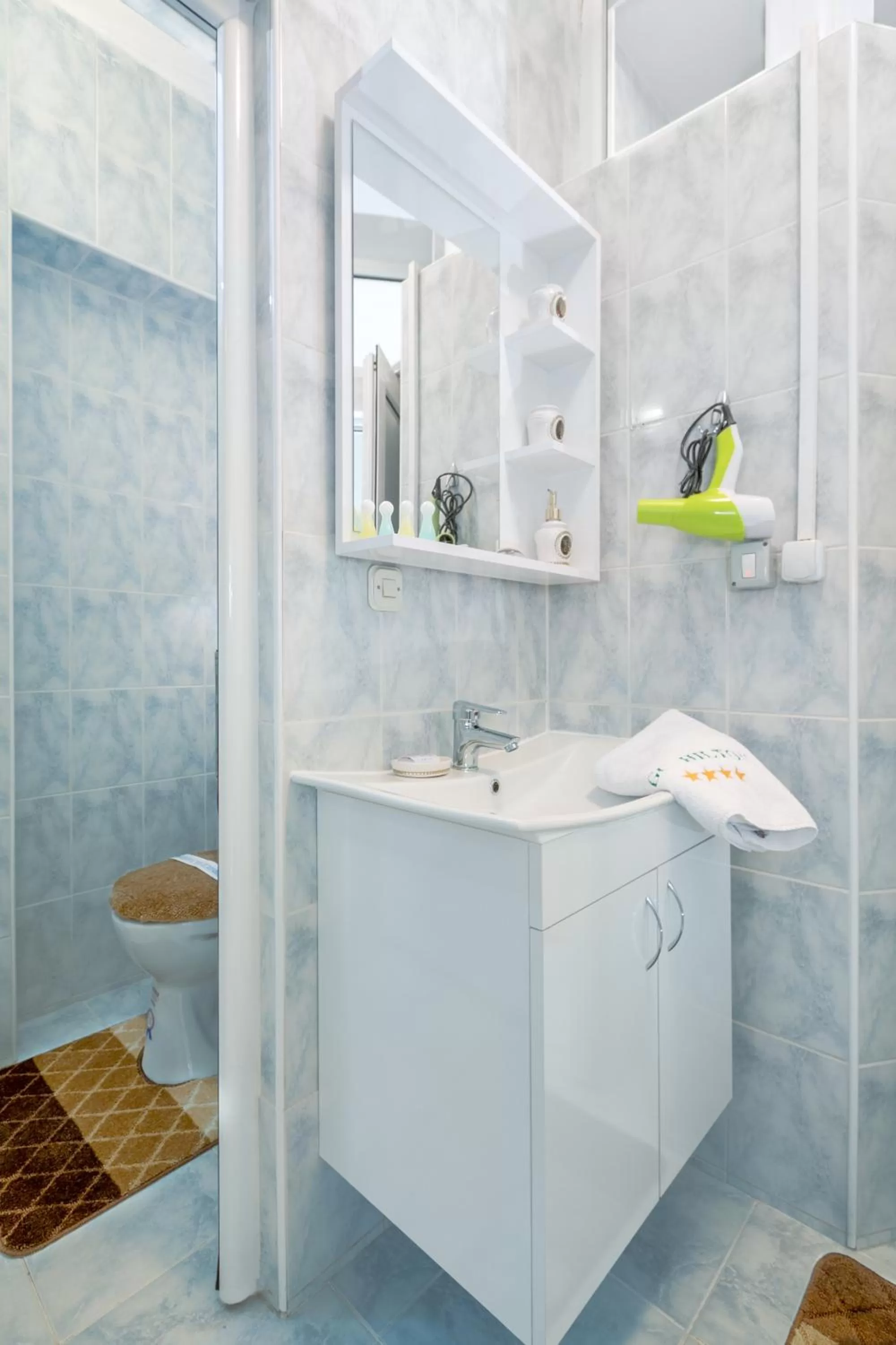 Bathroom in Hotel Green Center Gili