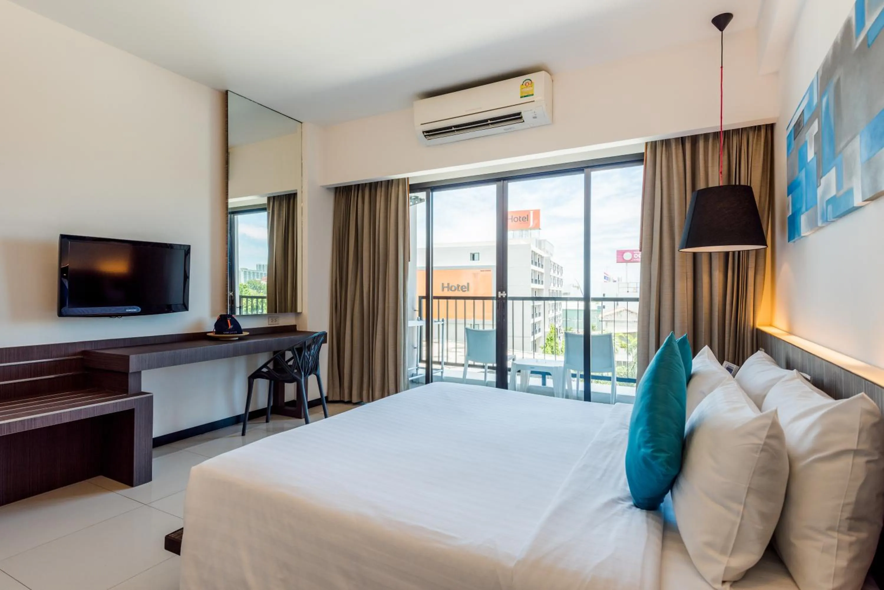 Bed in Hotel J Residence Pattaya