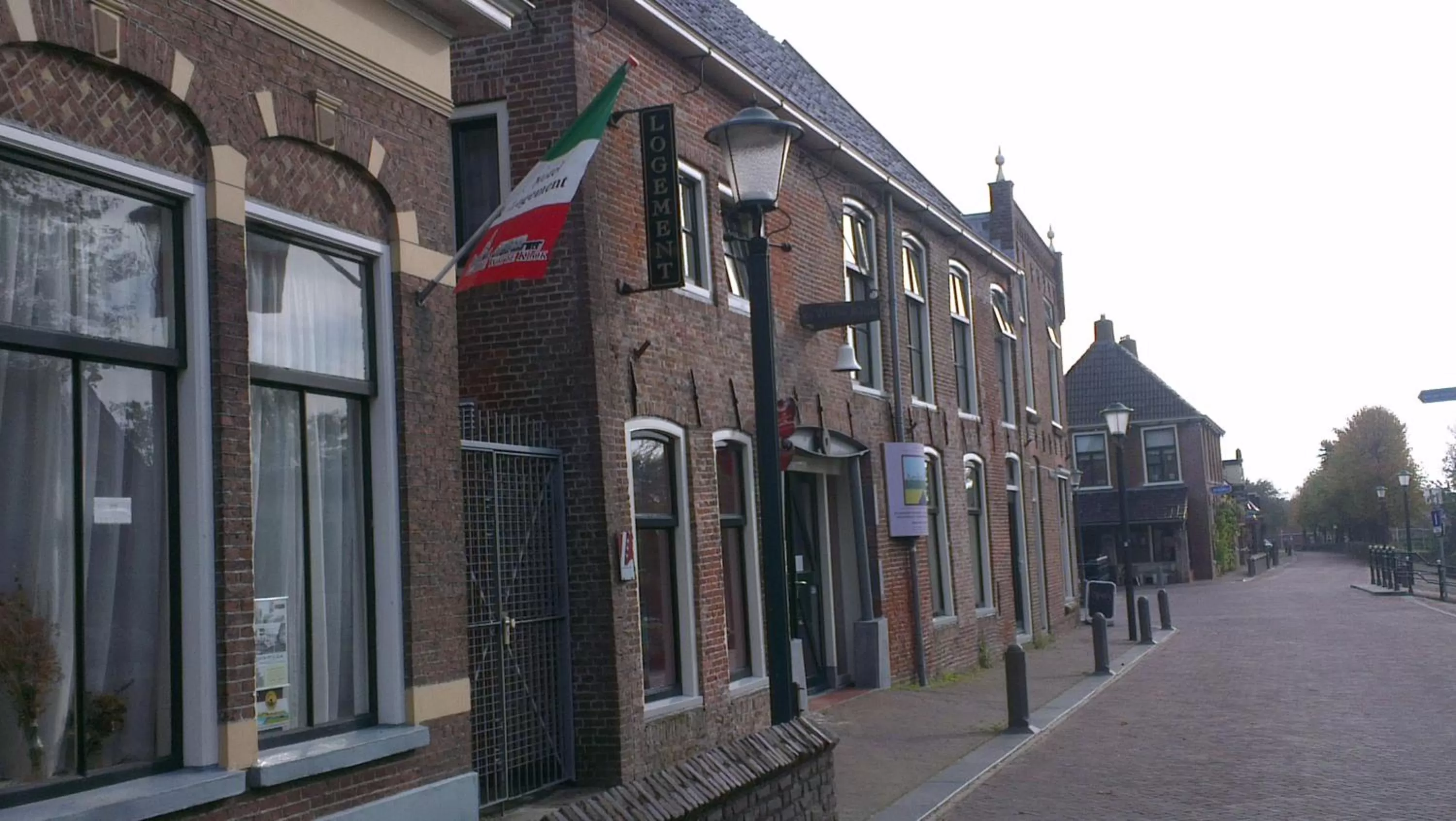 Facade/entrance, Neighborhood in Logement 'De witte klok'