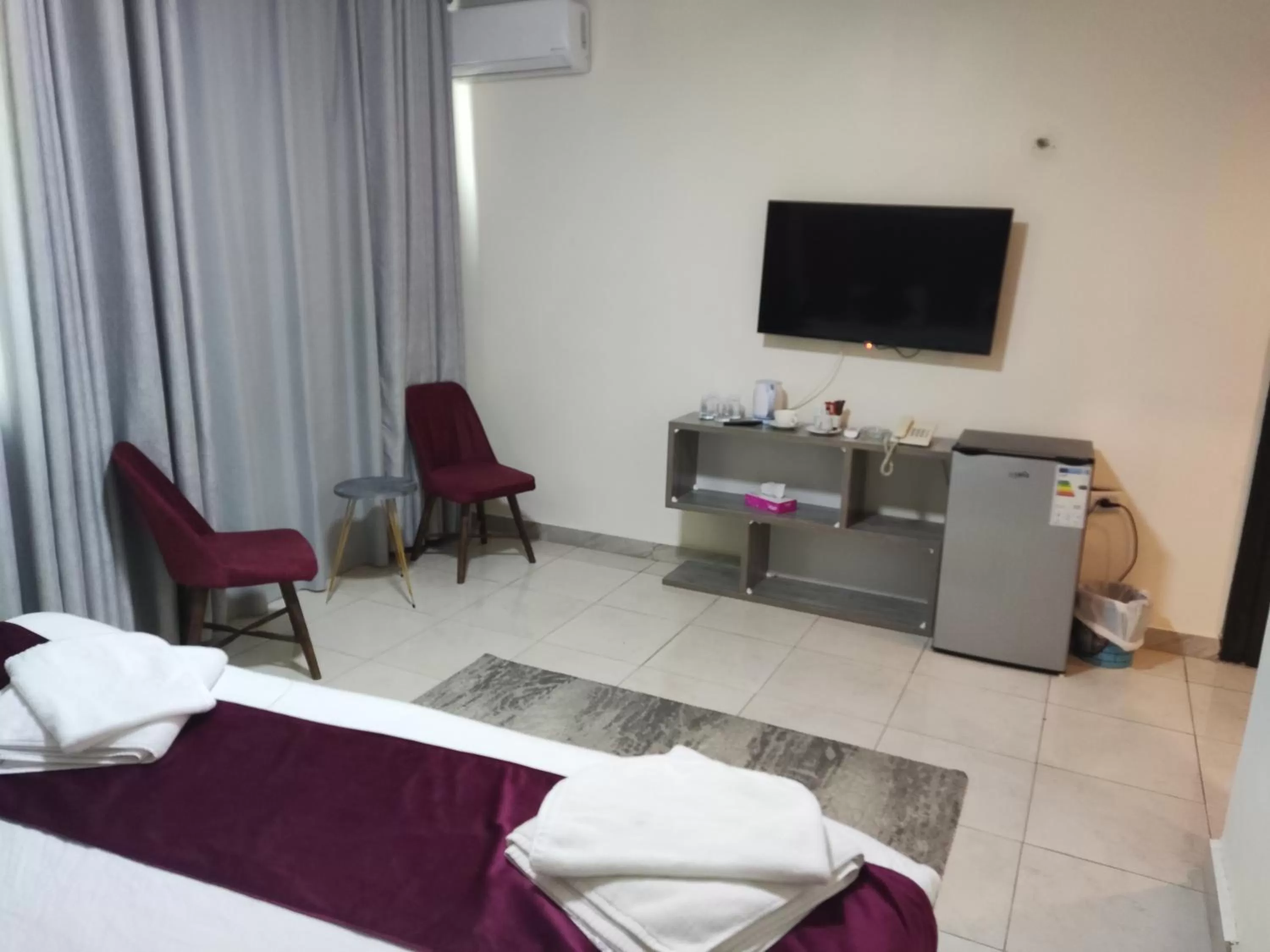 Bed in Golden Plaza Hotel