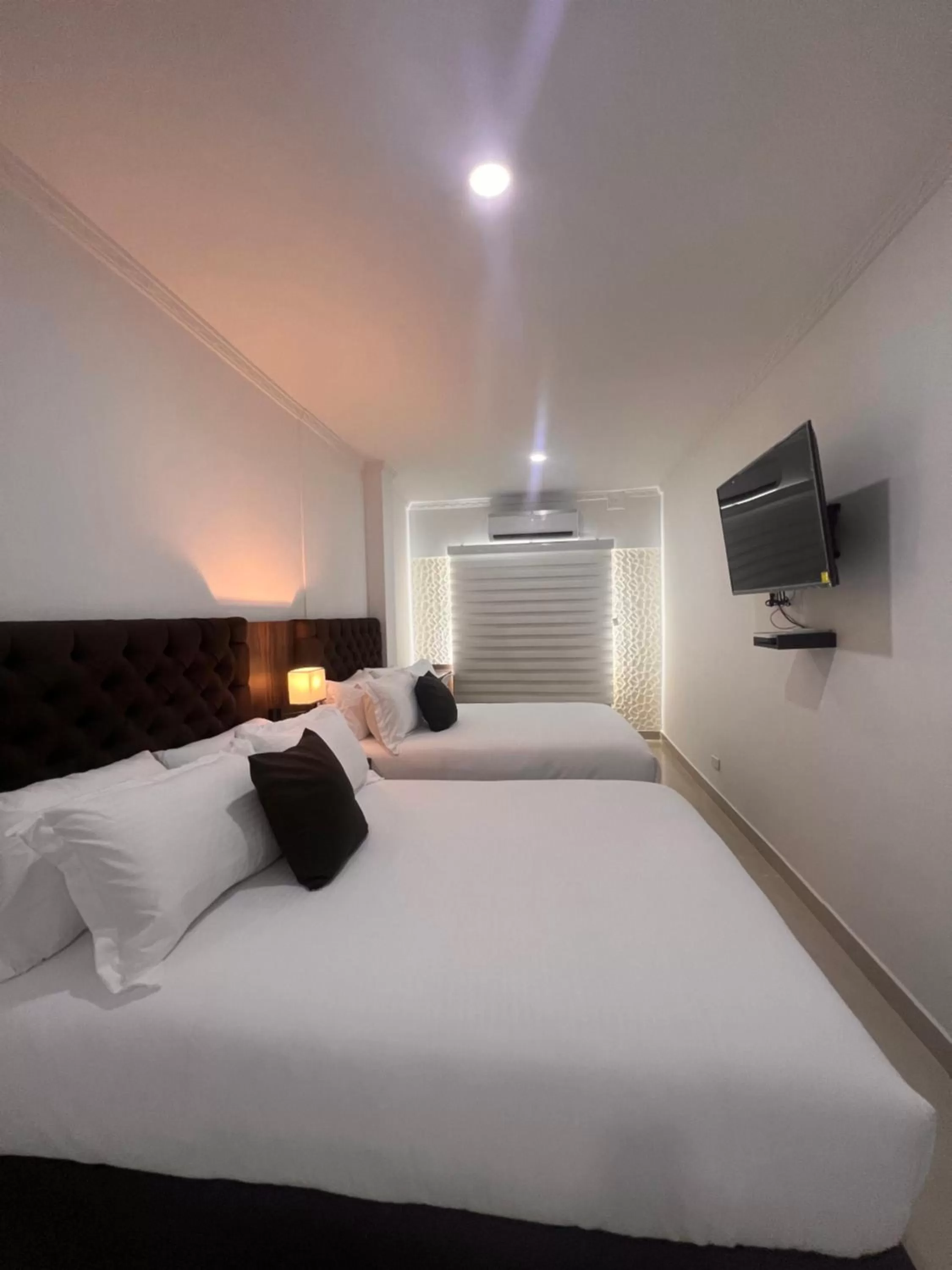 Bed in Hotel Zuriel Boutique