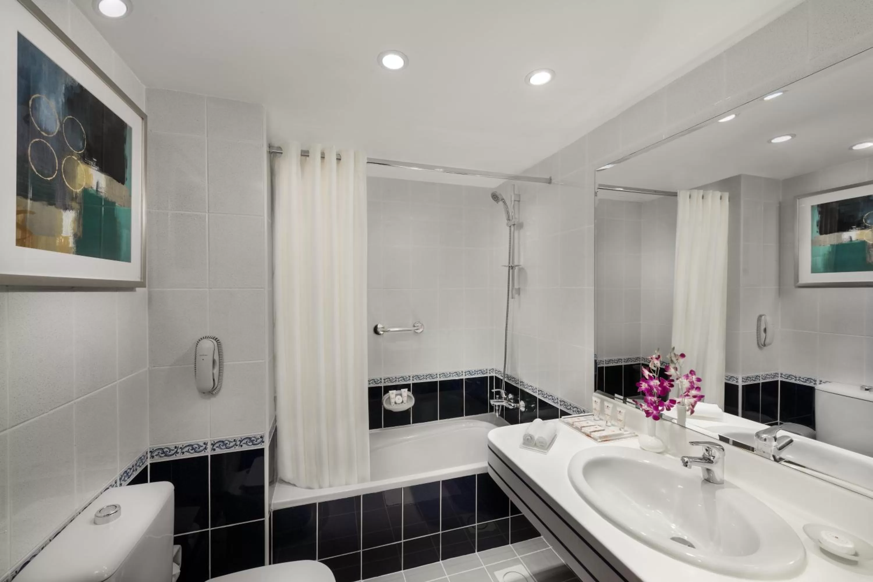 Toilet in Savoy Central Hotel Apartments