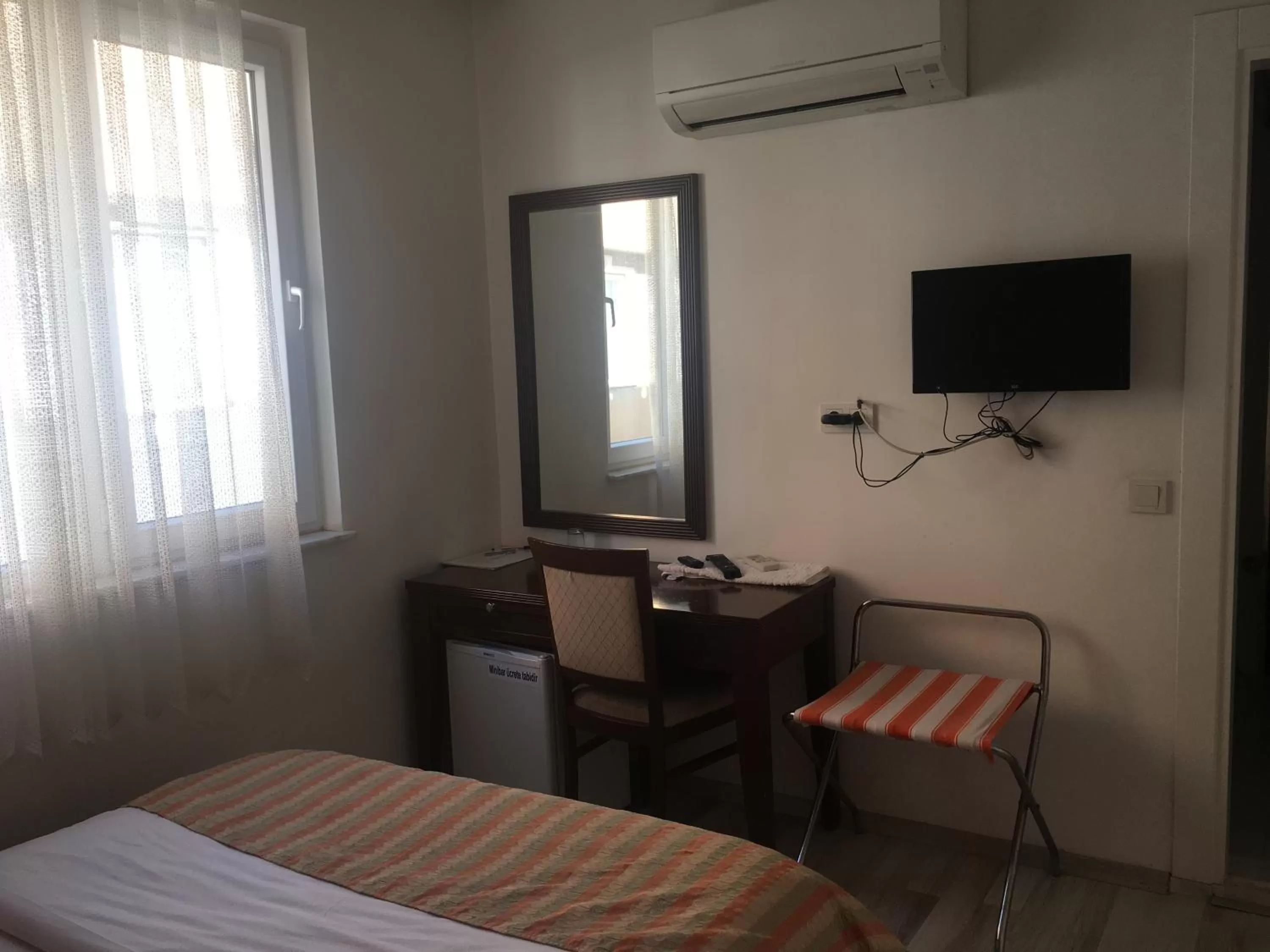 Decorative detail, TV/Entertainment Center in Mutado Hotel