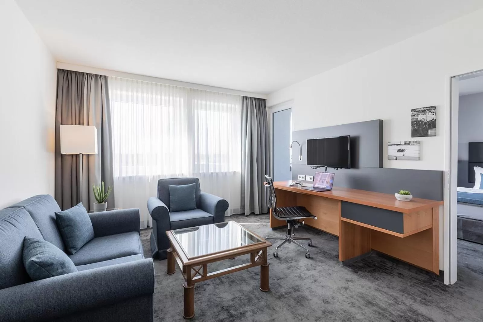 Living room in Garner Hotel Rüsselsheim by IHG