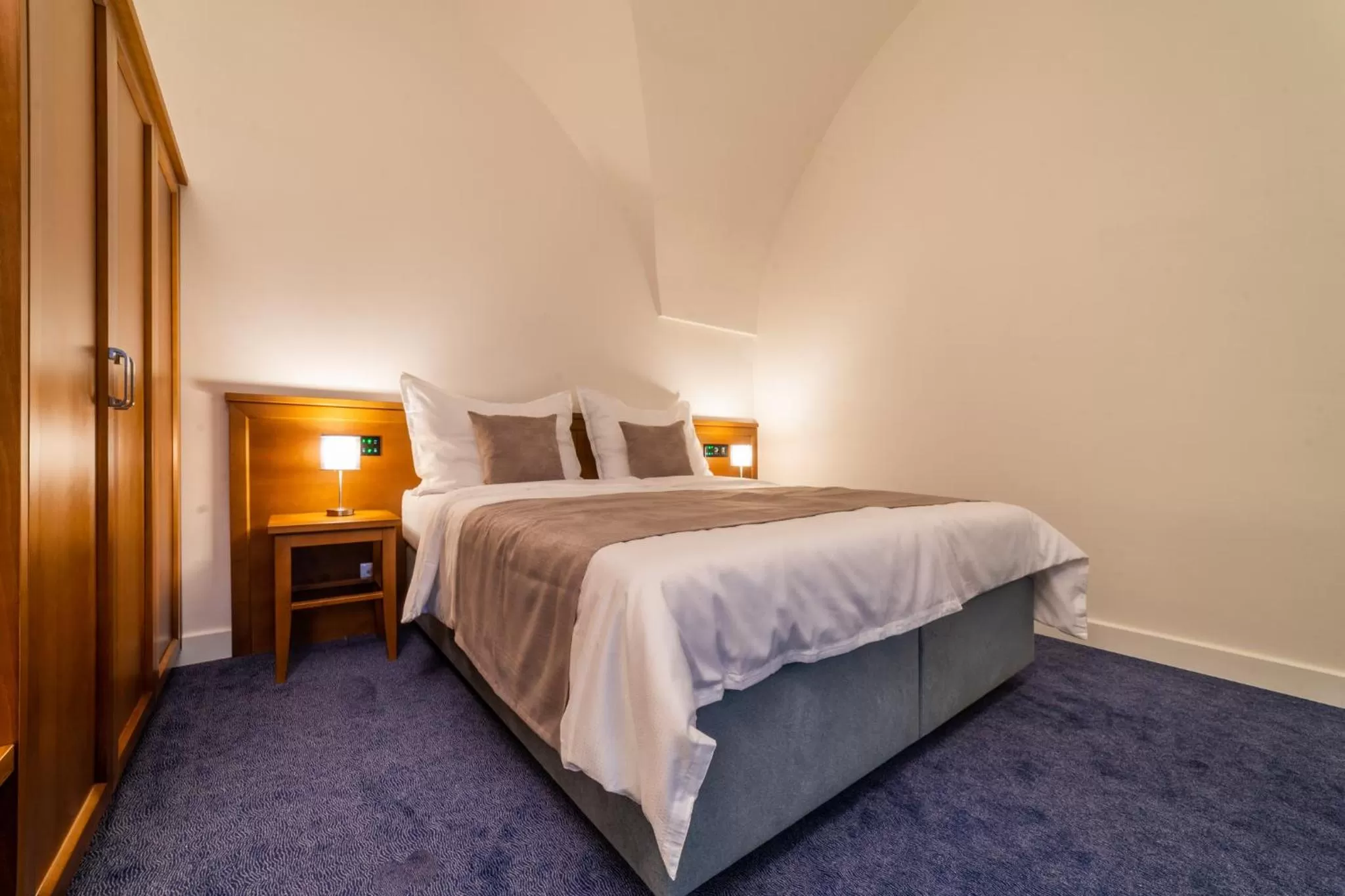 Bed in Hotel Panský Pivovar