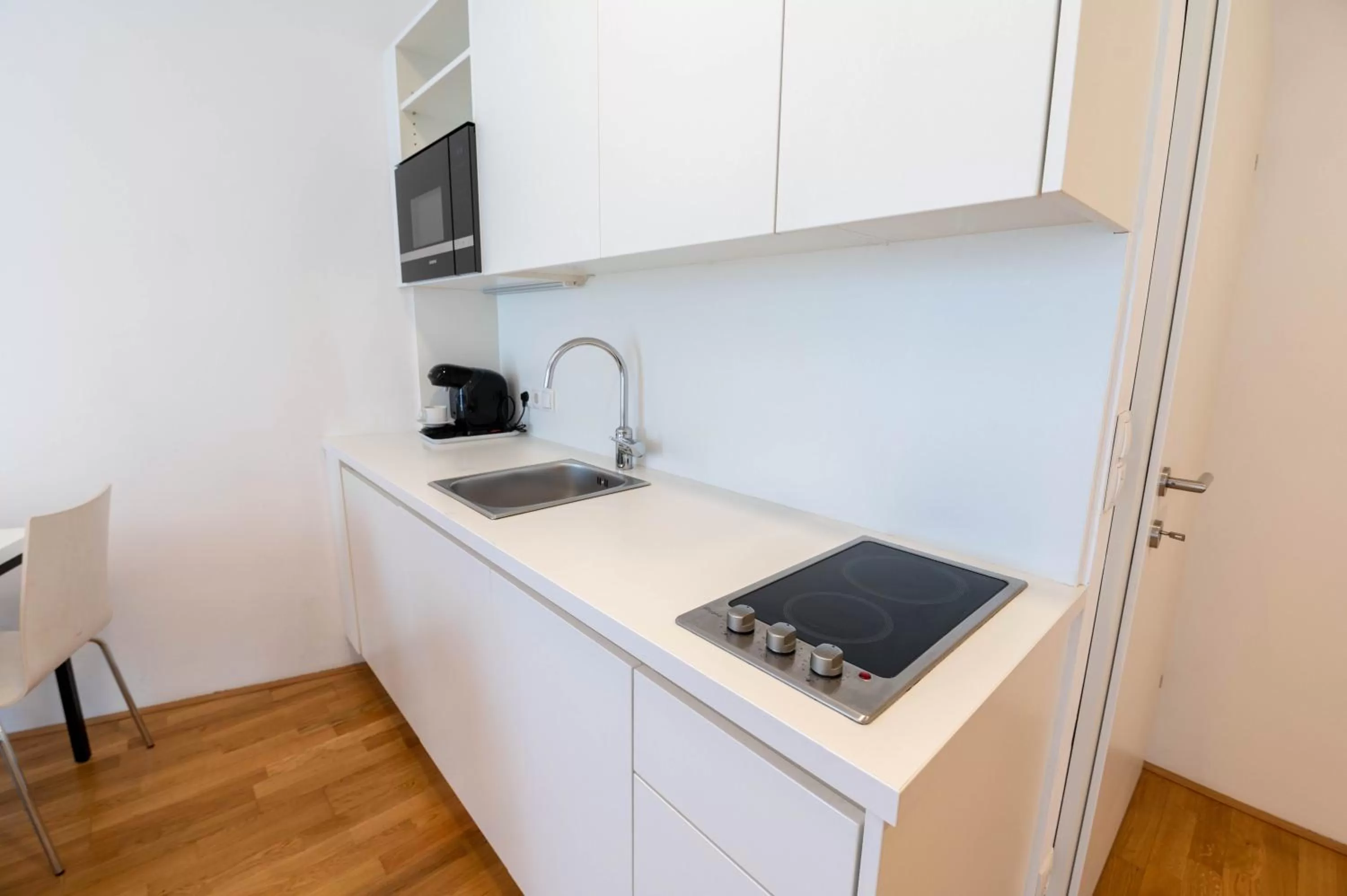 Kitchen or kitchenette in SHOME Hotel Graz I Self-Check-In I Free Parking