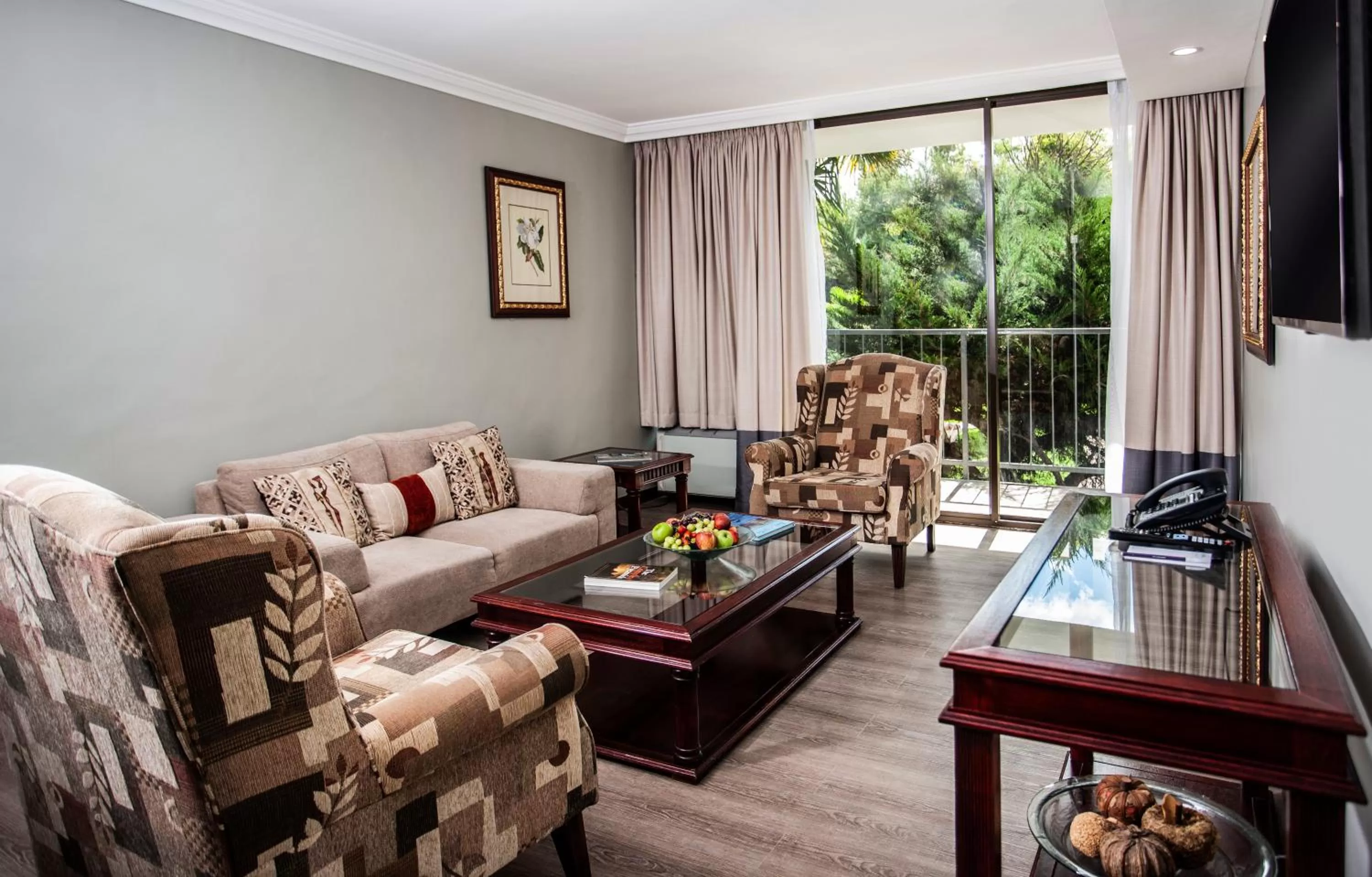 Communal lounge/ TV room in Avani Maseru Hotel