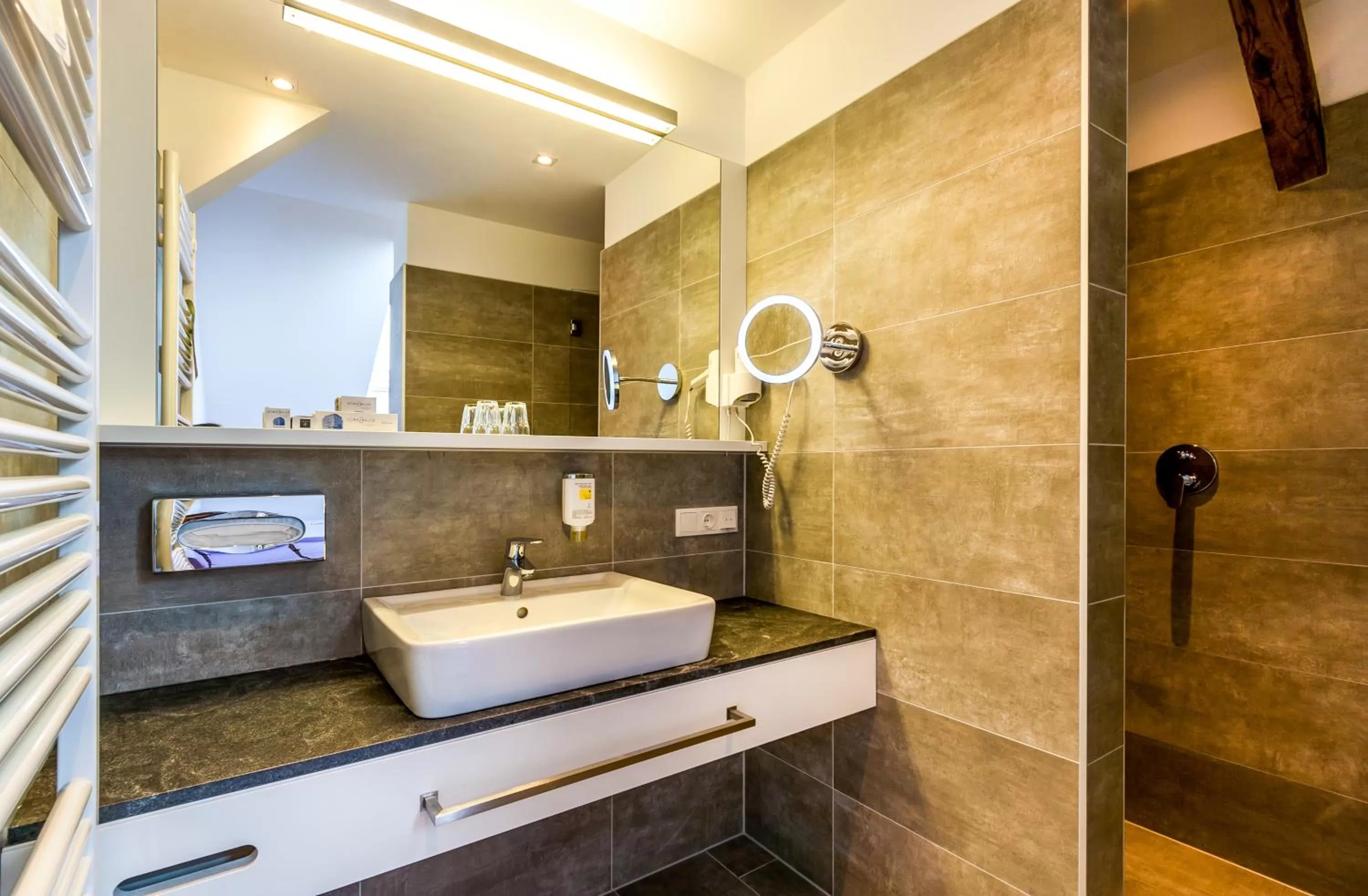 Bathroom in BoutiqueHOTEL Donauwalzer