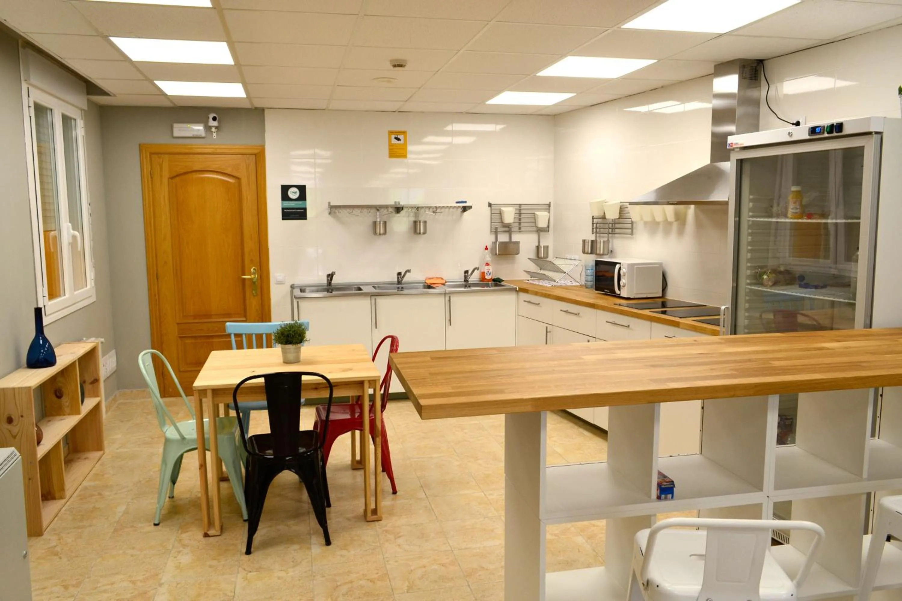 Communal lounge/ TV room in Alda Estella Hostel