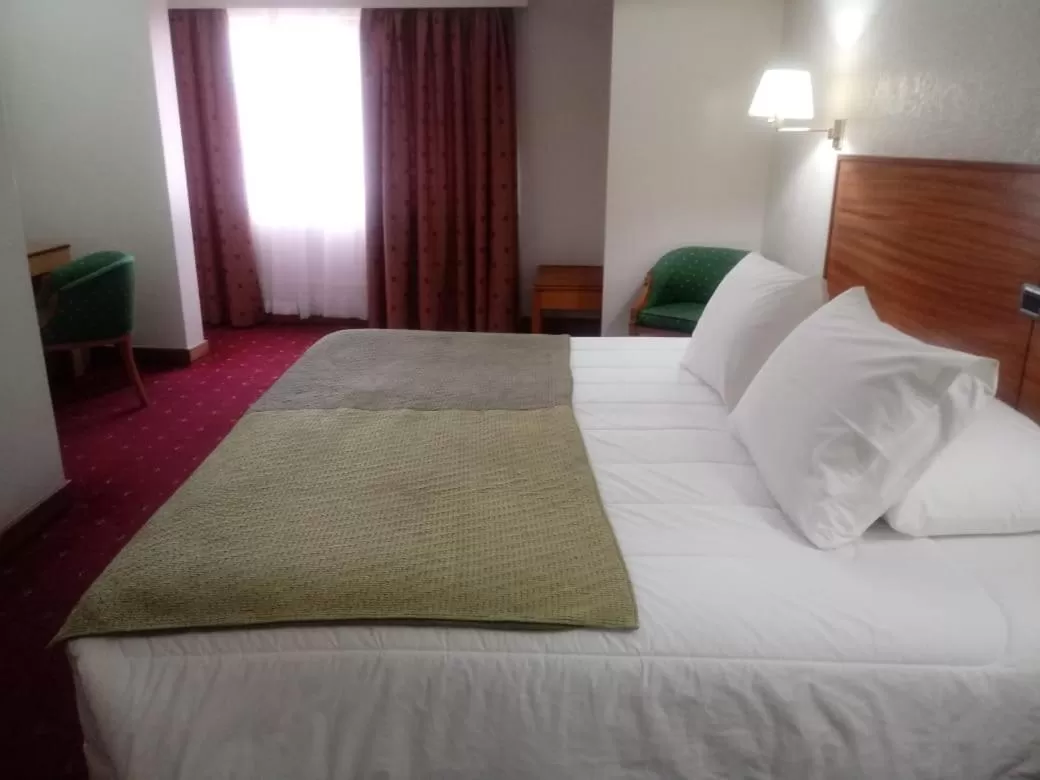 Bed in Hotel Gavina Express