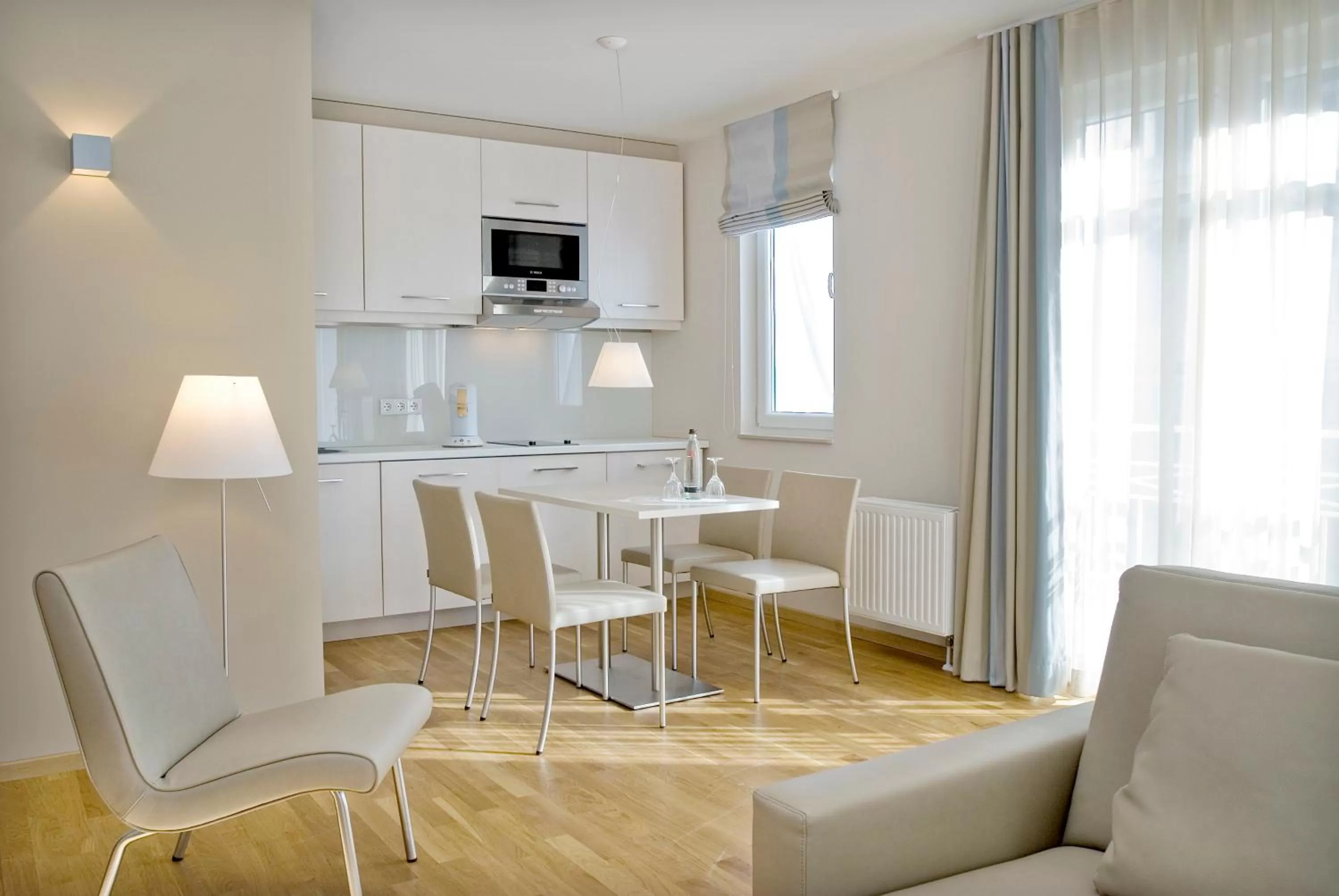 Kitchen or kitchenette in Nymphe Strandhotel & Apartments