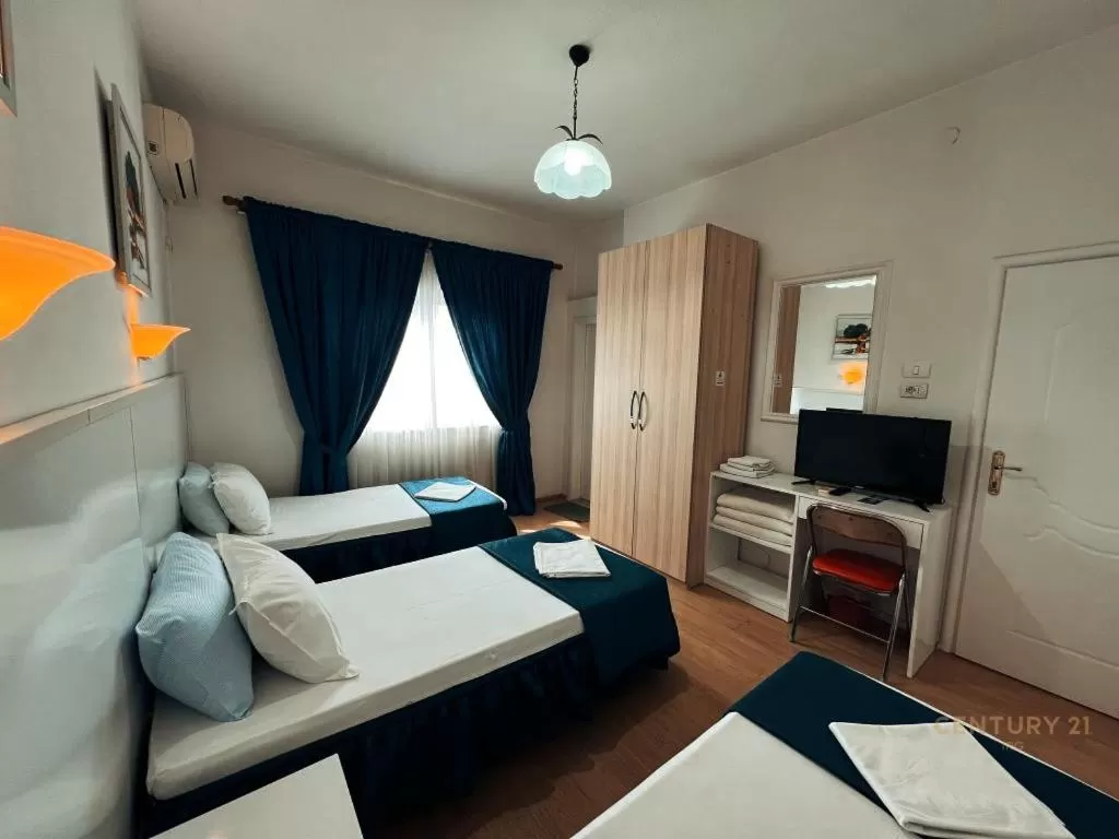 TV and multimedia, Bed in Tirana Central GuestHouse