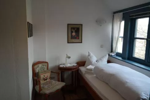 Photo of the whole room, Bed in Gästehaus Howe